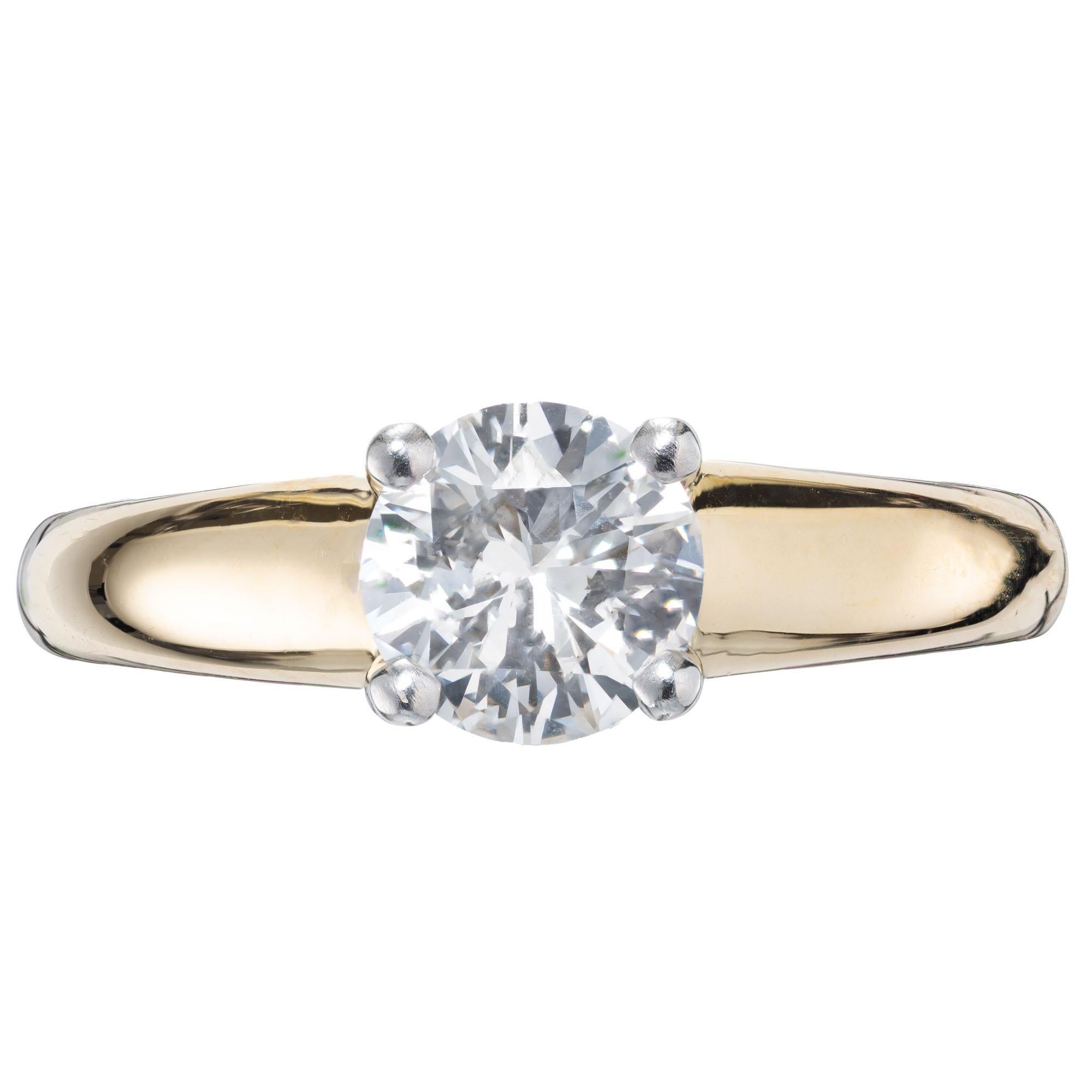 Alfred Butler solid 18k yellow gold curved platinum prong diamond solitaire engagement ring.

1 round brilliant cut diamond H-I VS, approx. 1.15ct EGL certificate # US 400132565D
Size 7.25 and sizable 
18k yellow gold 
Stamped: 18k
7.7 grams
Width