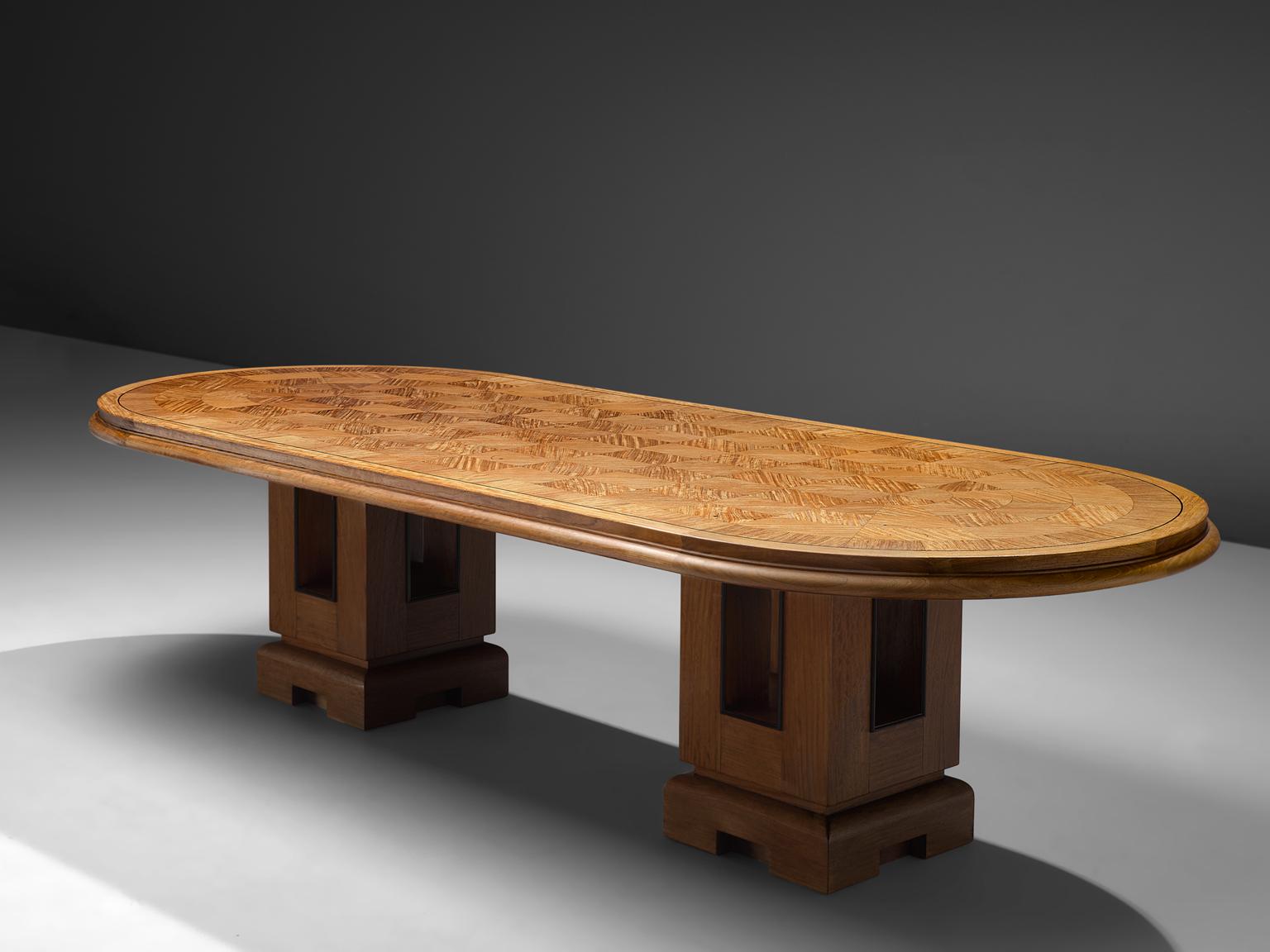 Alfred Chambon, 3 meter dining- or conference table in oak, France, 1930s. 

This custom made large Art Deco table is made by Alfred Chambon. It has been executed with a very detailed wooden inlay on top. It shows great craftsmanship, as can be seen