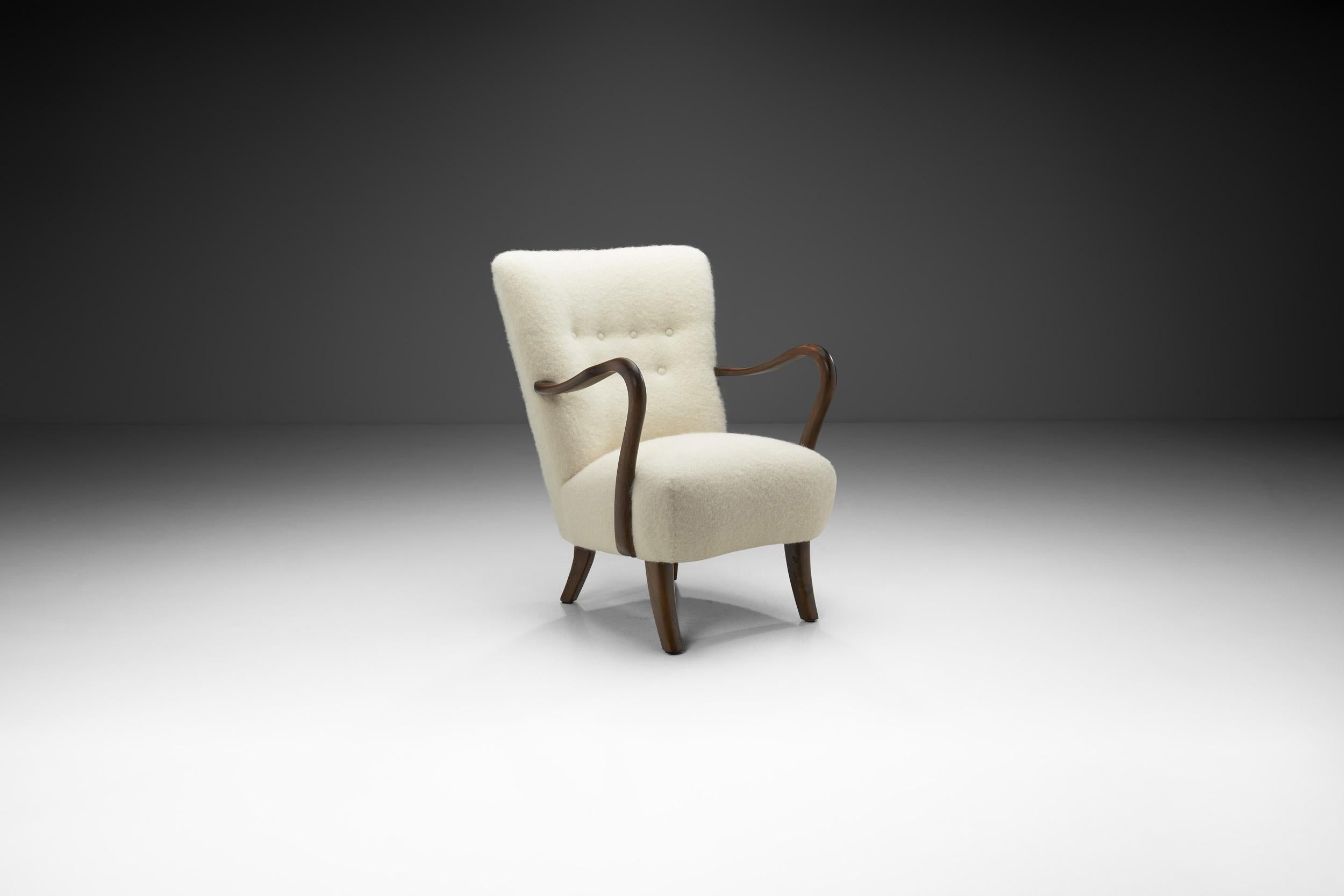 Danish Modern focused more on the aesthetics of modern design whilst employing the exquisite technique and material familiarity of highly skilled craftsmen known as cabinetmakers. Alfred Christensen’s present armchair in this style is a rare and