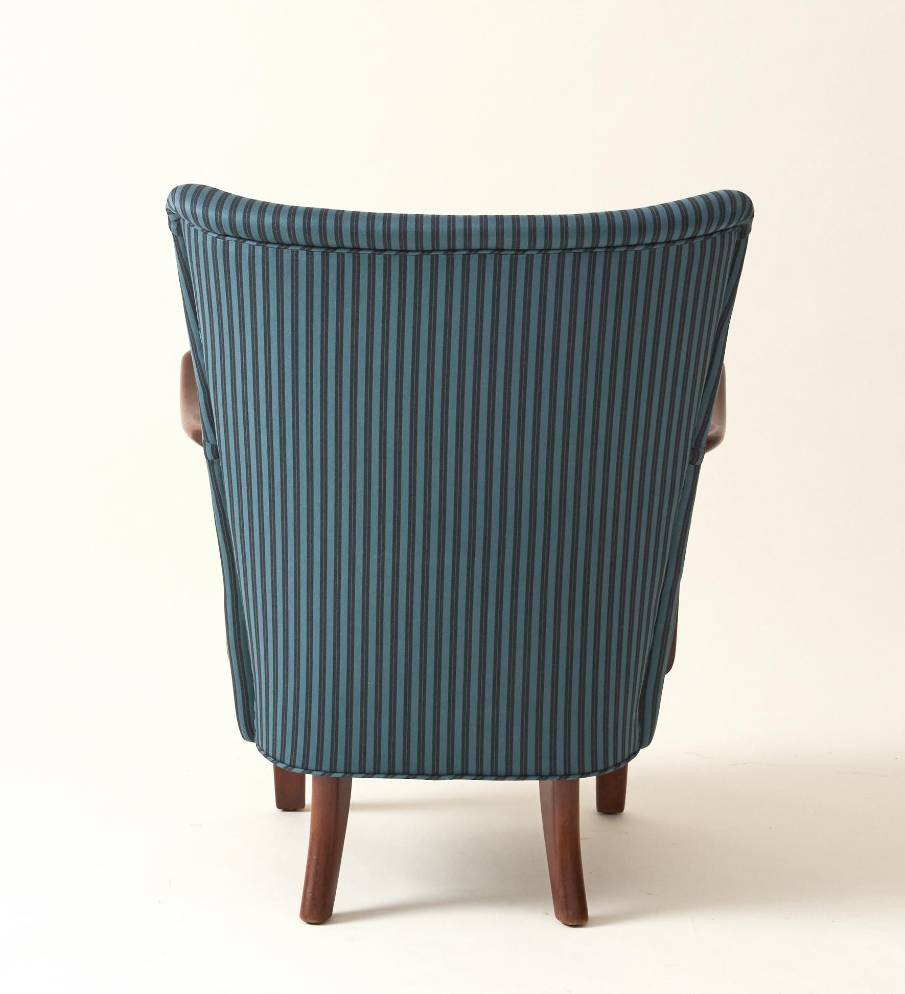 La sedia Easy di Alfred Christensen con struttura in faggio massiccio è un pilastro del design danese. I design di I. Christiansen sono noti per le loro linee semplici e pulite che incarnano un senso di calore e semplicità. Questa sedia comoda e