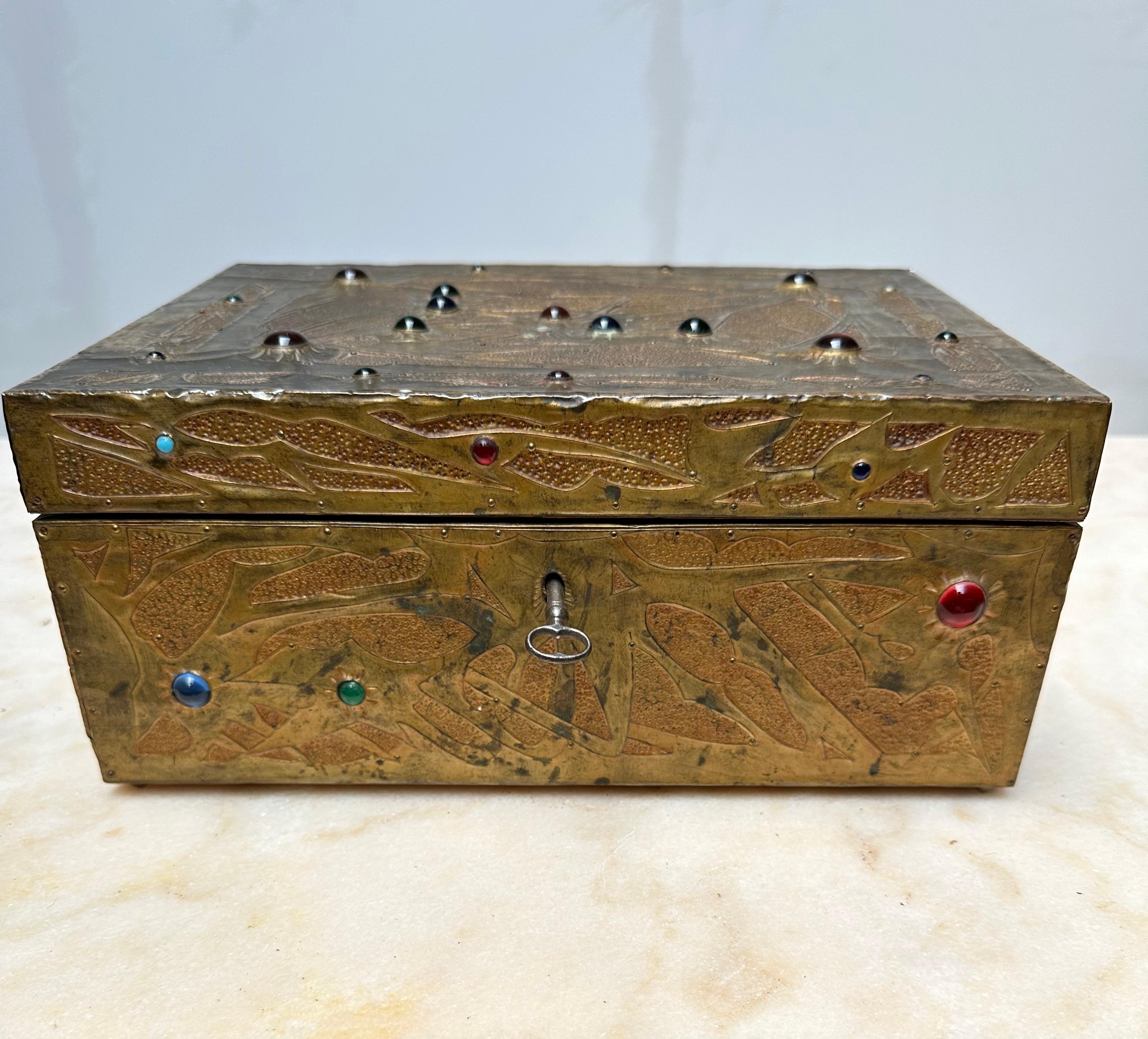 One of a kind and all hand-crafted, good size antique box by Alfred Daguet (1875-1942).

Alfred Daguet was a French craftsman/metalsmith, active around the early 1900s and who specialized in repoussé copper panels applied to hinged boxes, mantel