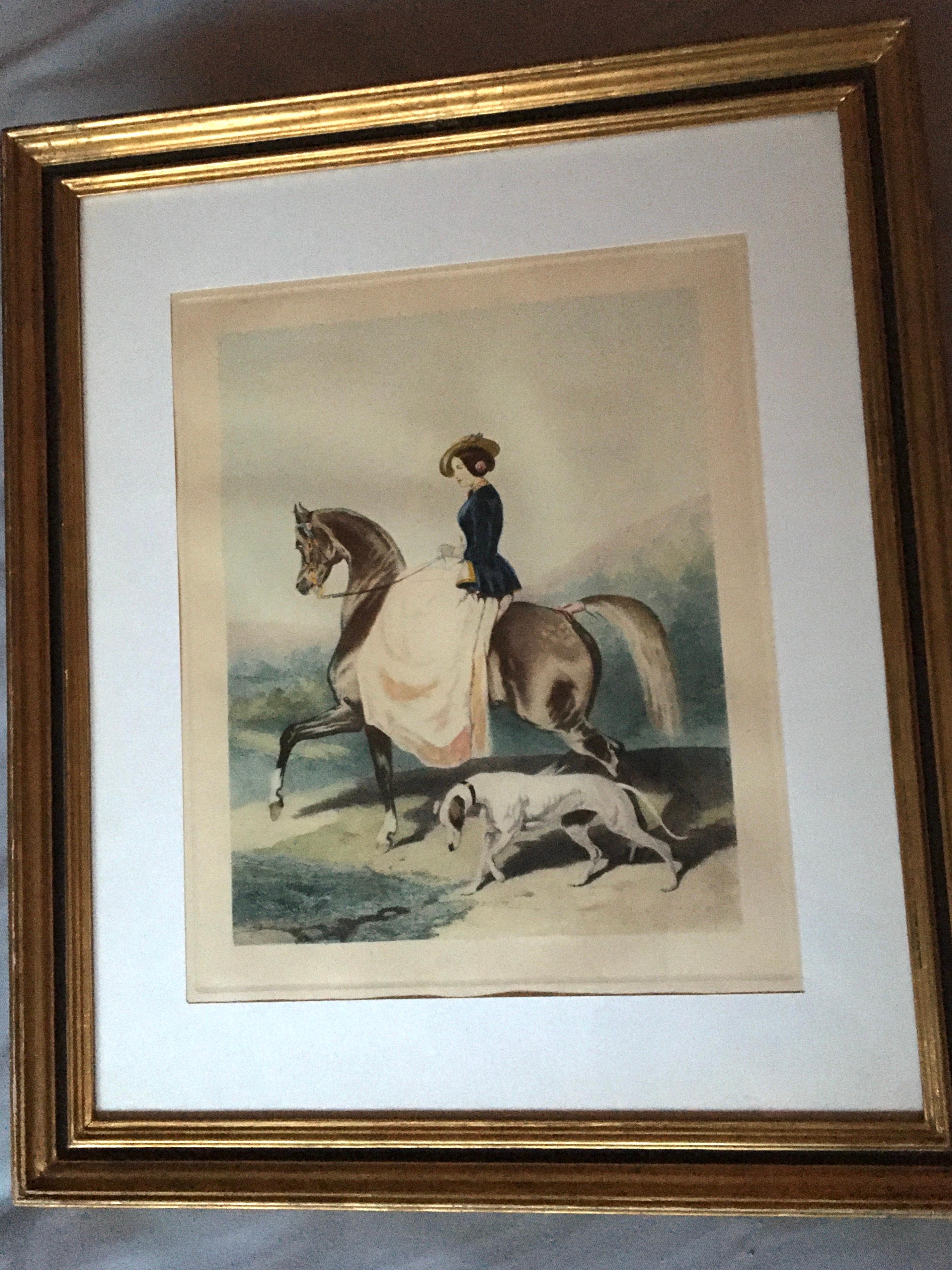 Charming color engraving print  from the 19th century representing a young horse rider on a walk accompanied by her greyhound.
The engraving is taken from a painting made by Alfred de Dreux, ( 1810-1860 ) a French Portrait and animal painter in the
