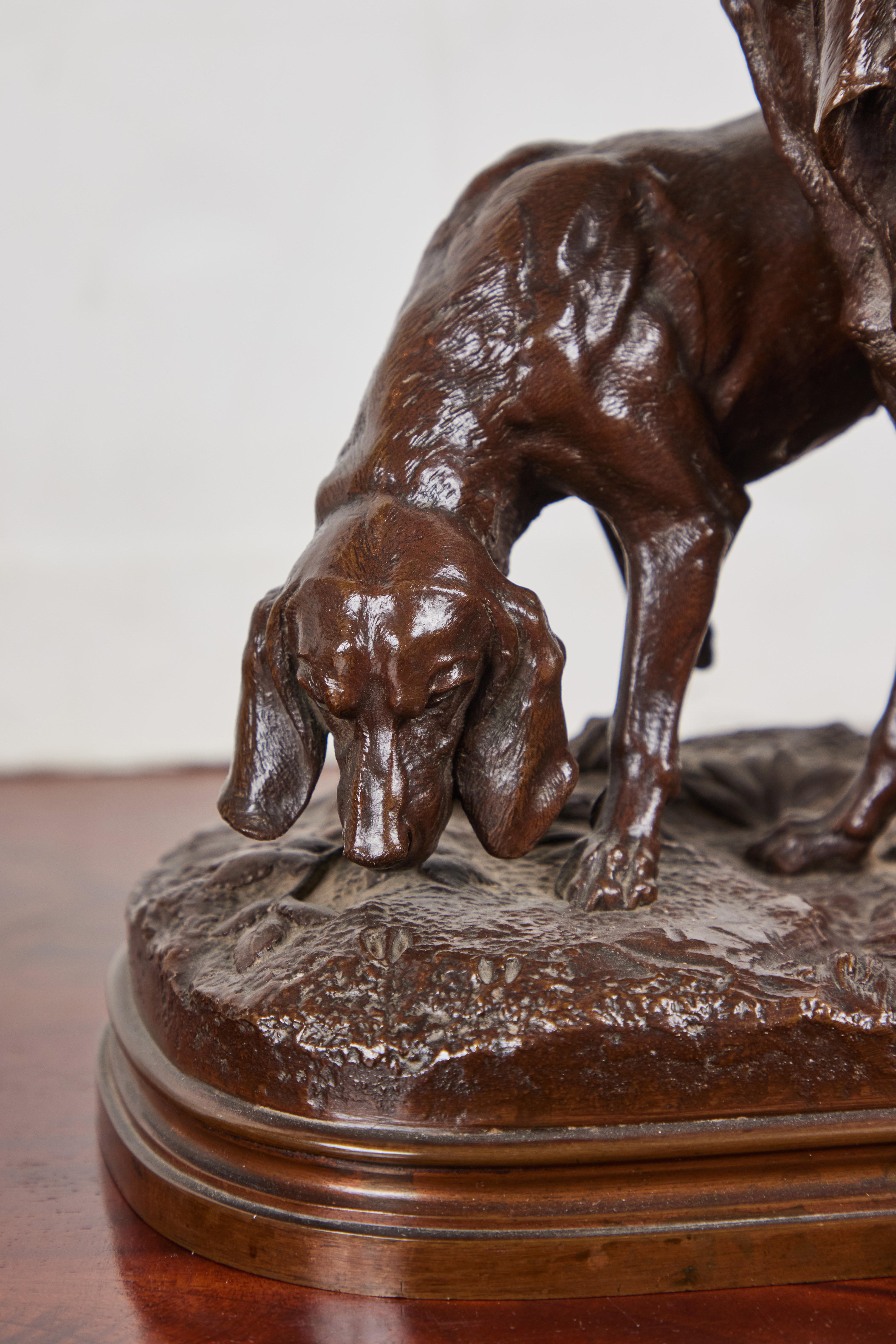 A lively, beautifully cast, patinated bronze sculpture of two hounds on a lush forest floor by listed French artist, Alfred Dubucand (1828-1894).

A proponent of Romantic Realism,  Dubucand was a prize pupil of the renowned founder of the French