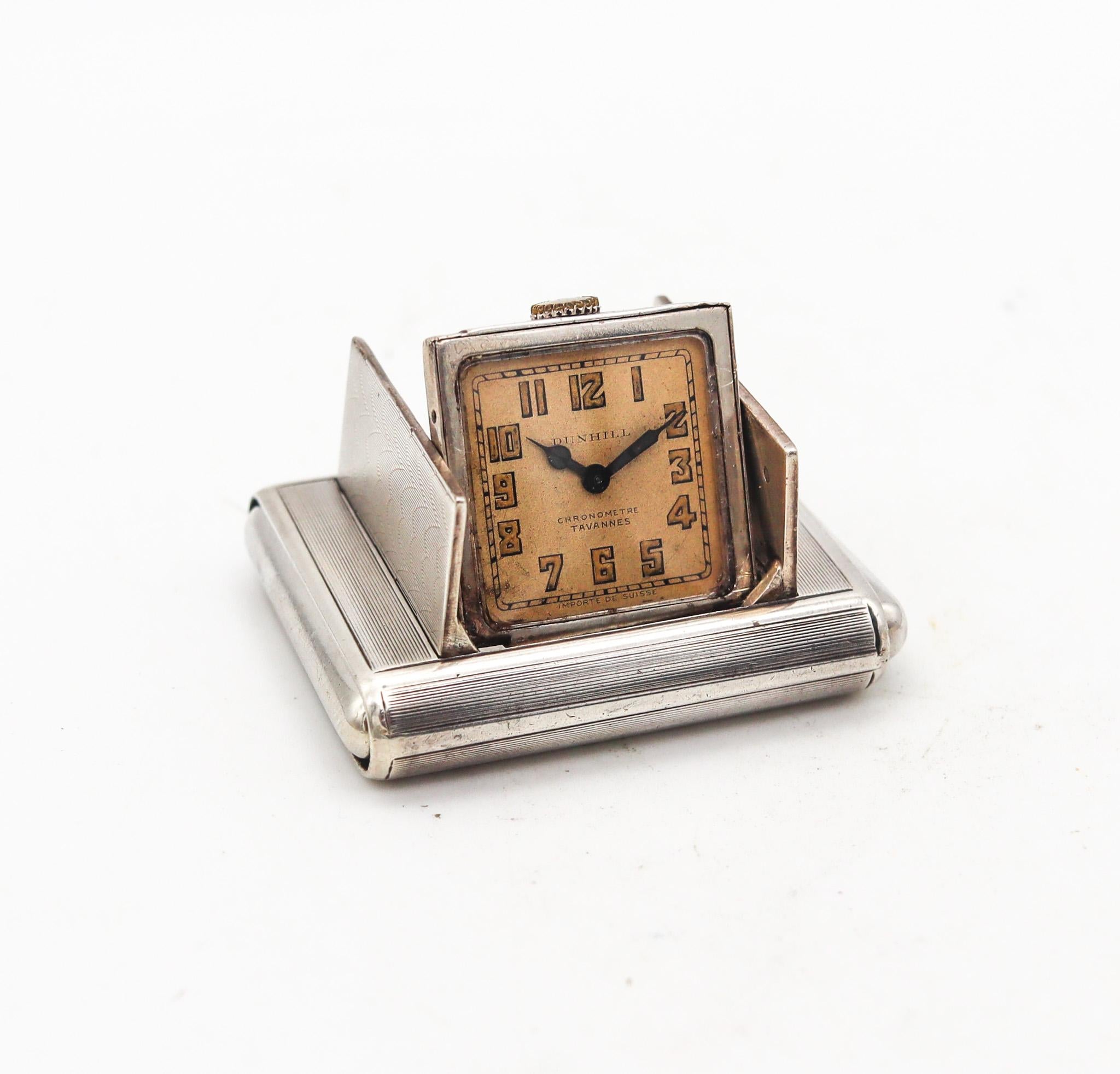Art deco La Captive travel-purse clock designed for Alfred Dunhill.

Beautiful and very unusual squeeze concealed 