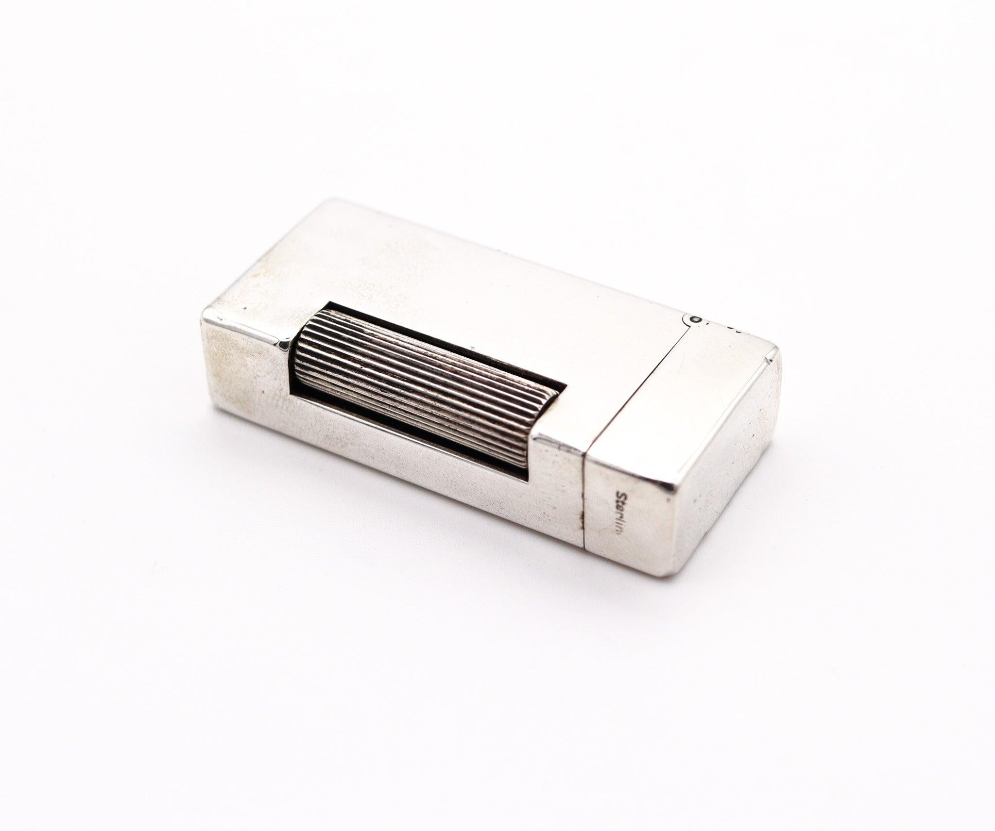 A rollalite lighter designed by Alfred Dunhill.

This is a very scarce petrol pocket lighter, created in Switzerland by La Nationale company for the Alfred Dunhill Company in London England, back in the 1940. This semi-automatic lighter is the