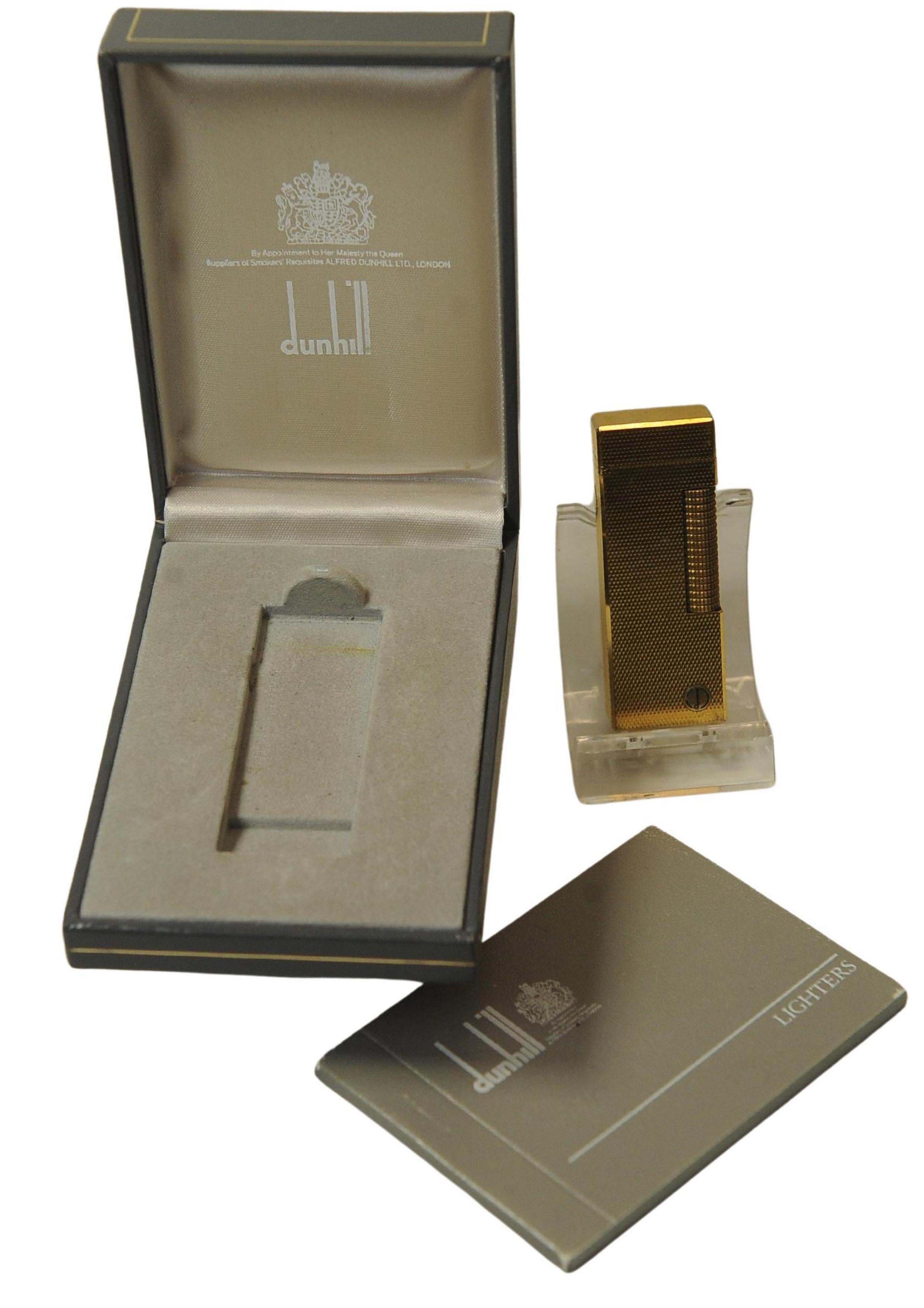 Alfred Dunhill Gold Plated Briquet Rollagas Cigarette Lighter

Vintage boxed Dunhill lighter with booklet stamped at purchase 1992
Stamped Dunhill and Swiss Made on base.

