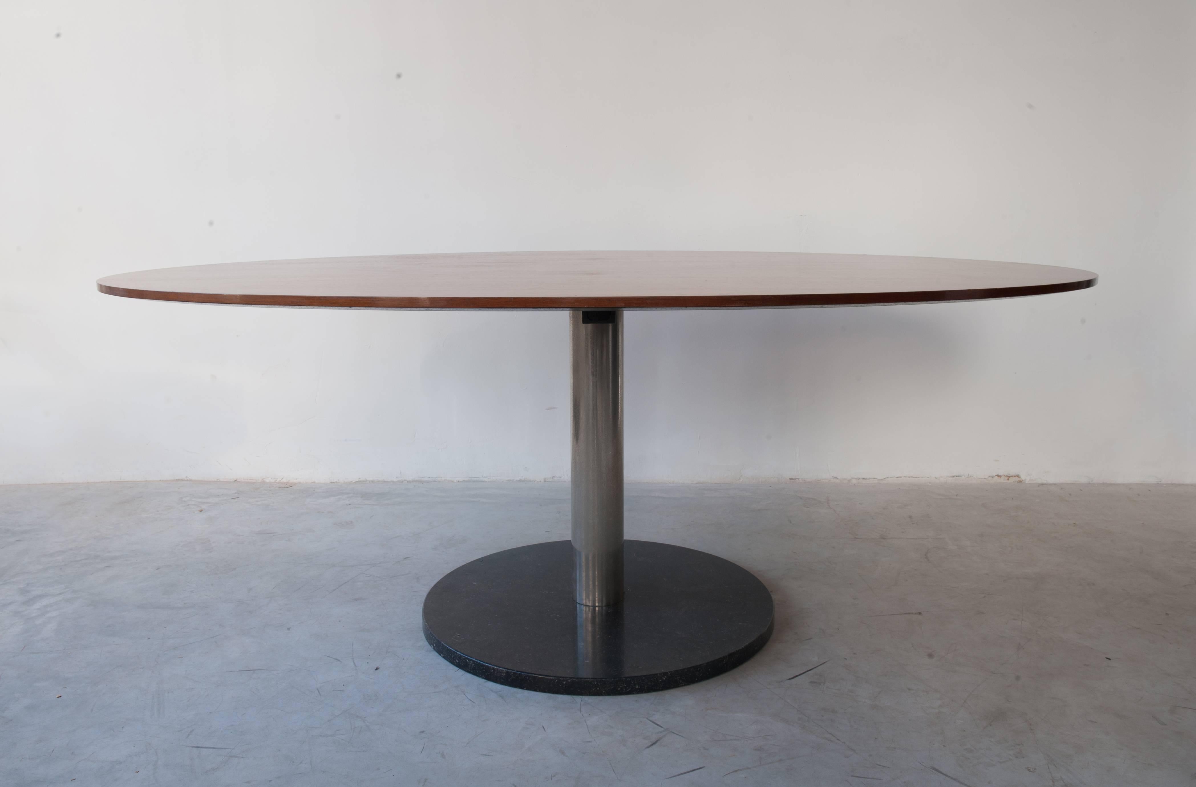 Dining table in walnut, chrome tube, and black marble base by Alfred Hendrickx for Belform, Belgium, 1960s.
Oval shaped dining room table featuring a beautiful grain in the walnut veneer on an chromed frame and black marble base. This table is