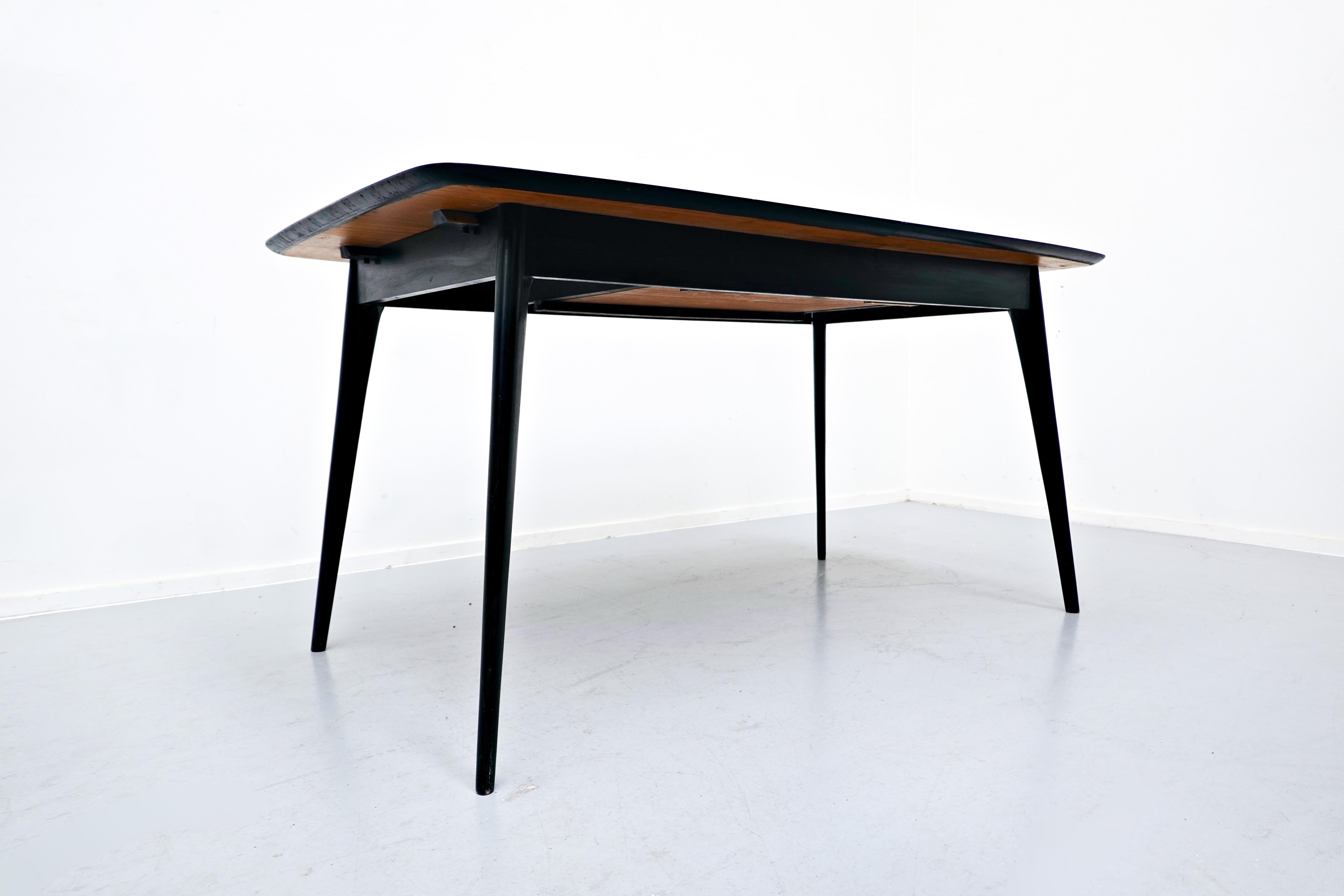 Alfred Hendrickx extendable dining table, 1970s, Belgium, Mid-Century Modern, European
Mid-Century Modern
Alfred Hendrickx, Belgian designer, was born in 1931.
He uses fine woods like rosewood and teak as well as less luxurious materials like
