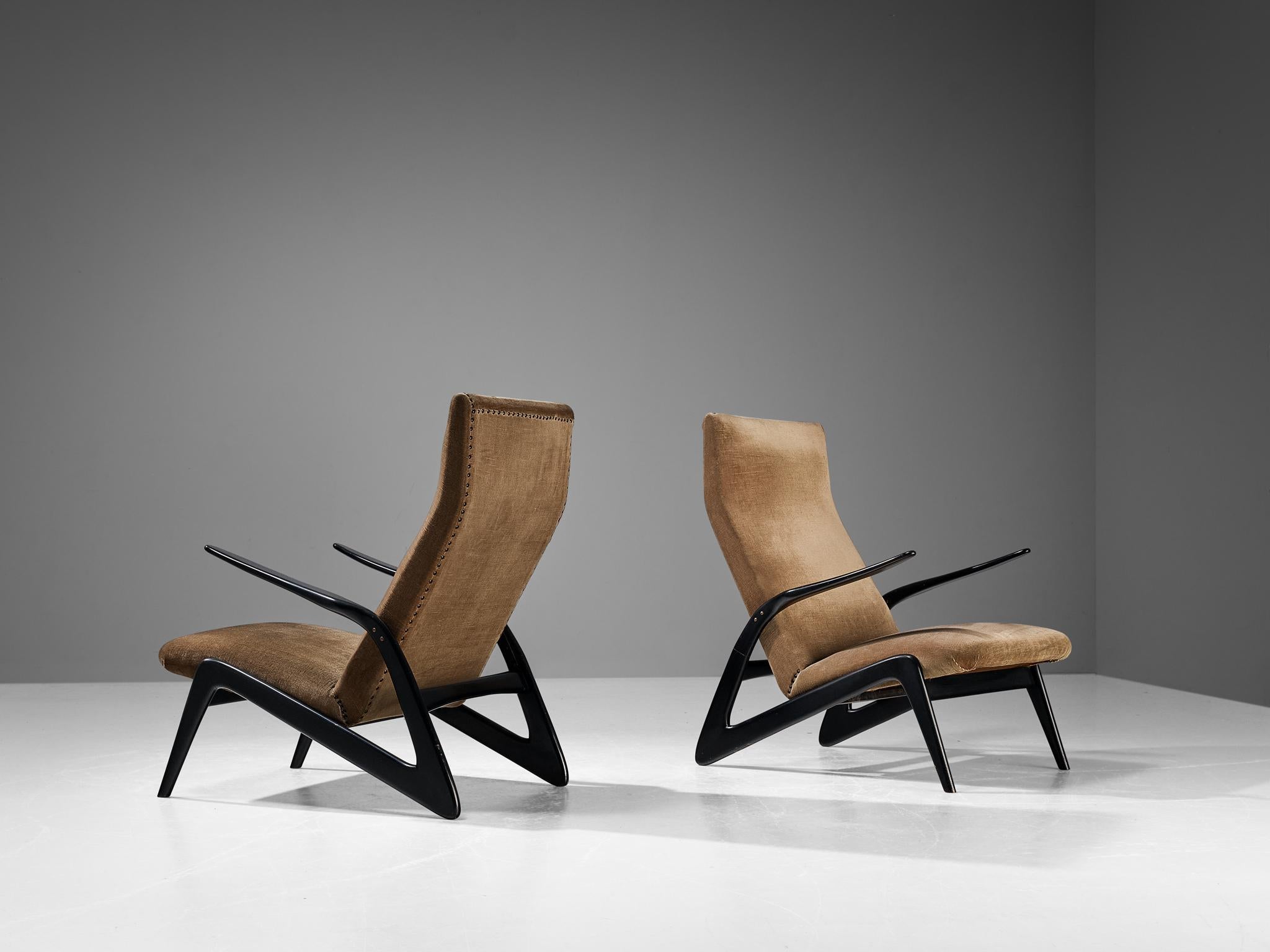 Alfred Hendrickx for Belform, pair of lounge chairs, blackened wood, fabric, Belgium, circa 1955

A sophisticated pair of lounge chairs by the Belgian designer Alfred Hendrickx produced by Belform. This design definitely shows the hand of the