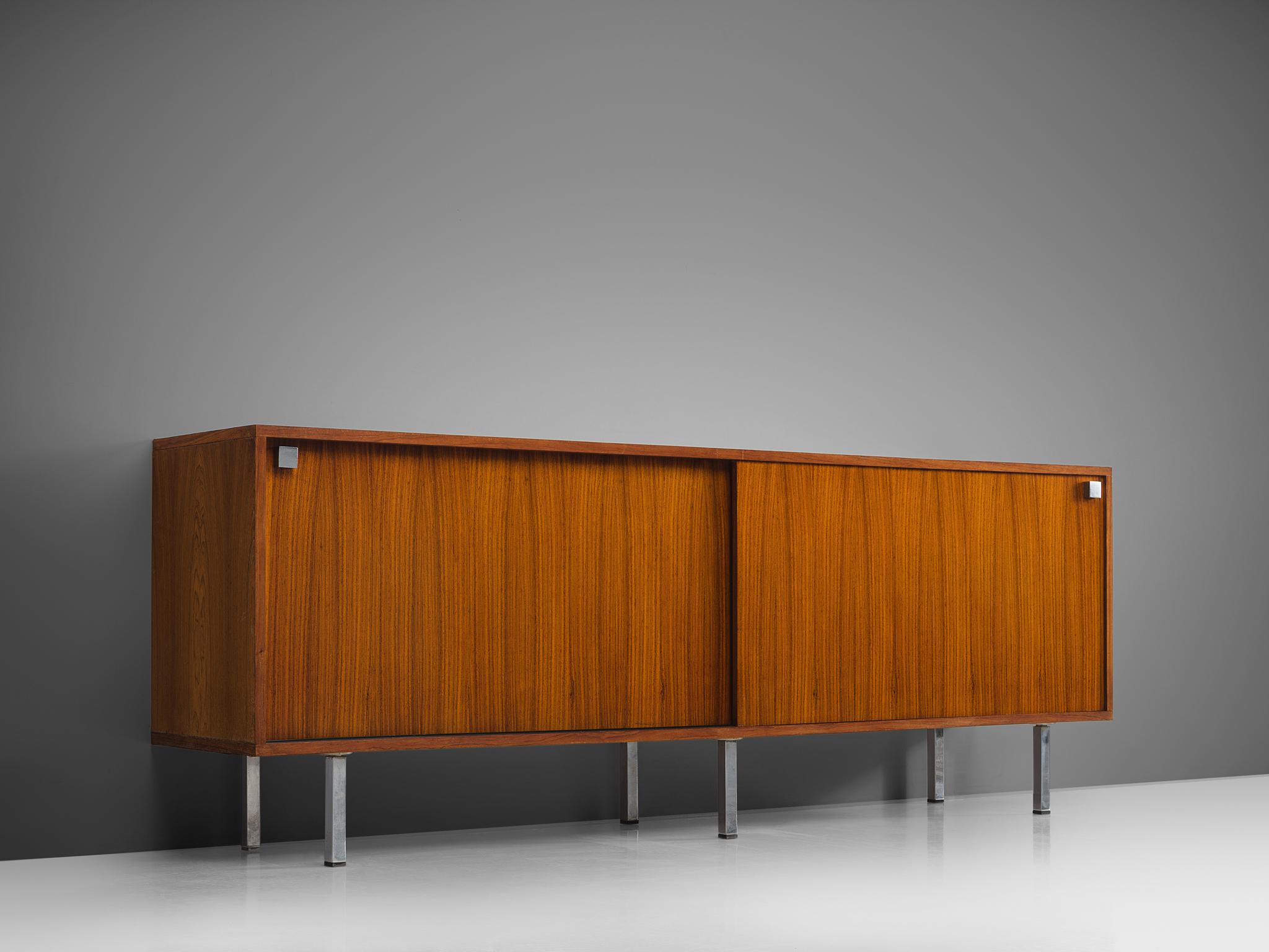 Alfred Hendrickx for Belform, sideboard, rosewood, steel, Belgium, 1960s

This sideboard is designed by the Belgian designer Alfred Hendrickx. This credenza features two sliding doors with characteristic square aluminium handles. The design of this