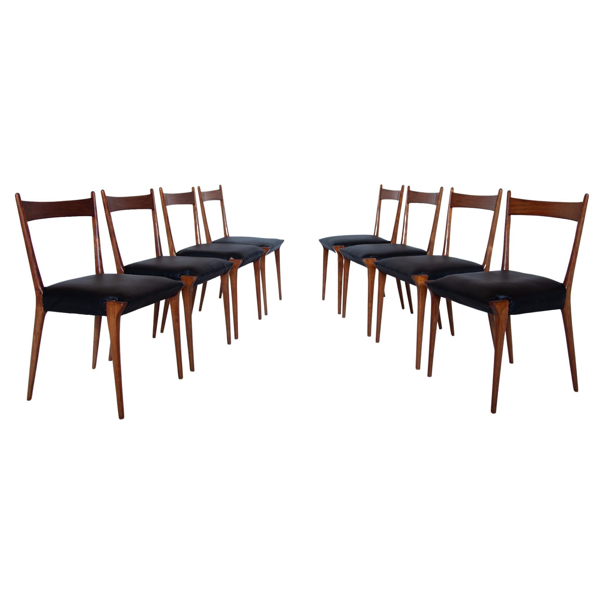 Set of eight very rare Model S2 chairs designed by Alfred Hendrickx in 1958 for Belform.
Although the chairs look very fragile they are very solid in their construction. The wood silhouette is very cleverly done while the top part looks very