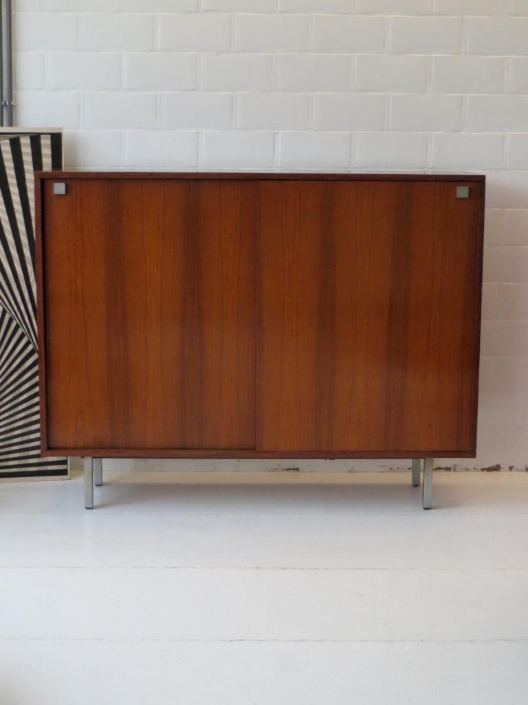 Fantastic highboard  with a very nice woodveneer grain,
designed by Belgian designer Alfred Hendrickx for Belform Belgium around 1960.

This highboard identifies clearly the Alfred Hendrickx his design in a typical minimal functionalism style, comes