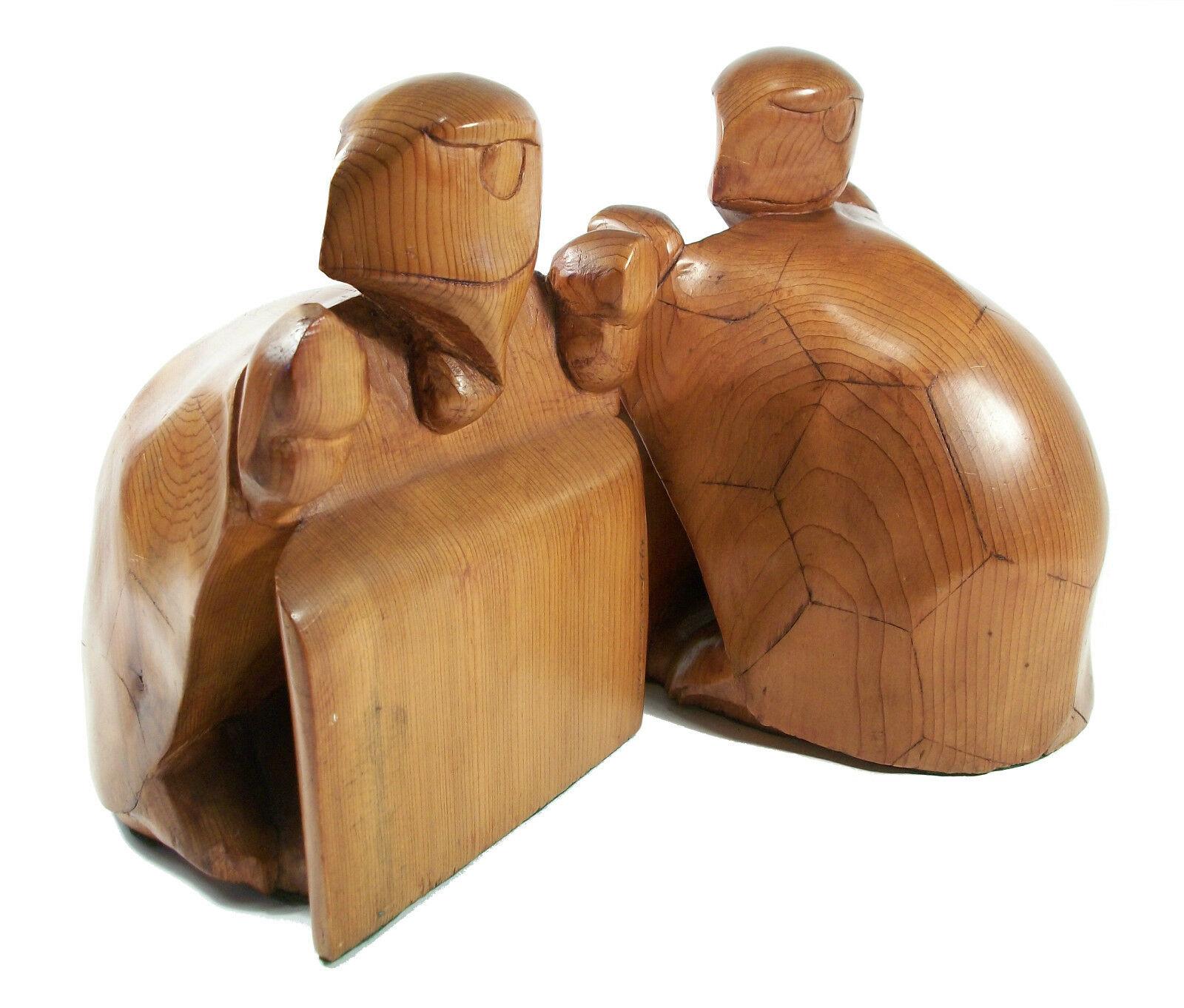 ALFRED JAMES PERRY - mid-century - folk art - turtle form bookends - articulated shell and features - each hand carved from a solid block of pine - weighted - original finish - each signed and dated - likely Canadian - circa 1950.

Excellent