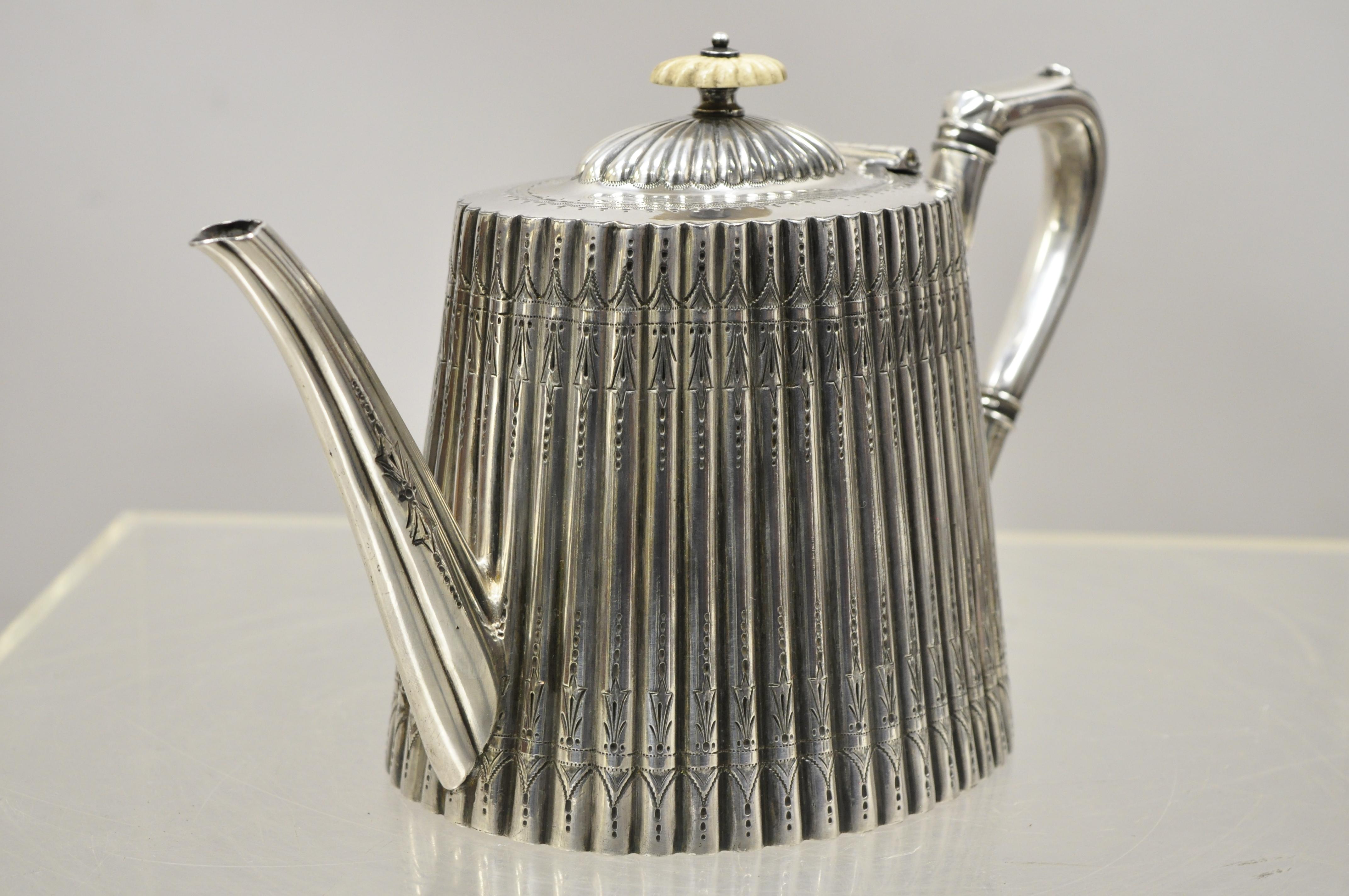 Alfred Lindley Sheffield English Edwardian Victorian silver plate chased teapot (E). Item features bone handle, chassed form, remarkable etchwork, original stamp, very nice antique item, circa late 19th-early 20th century. Measurements: 6.75