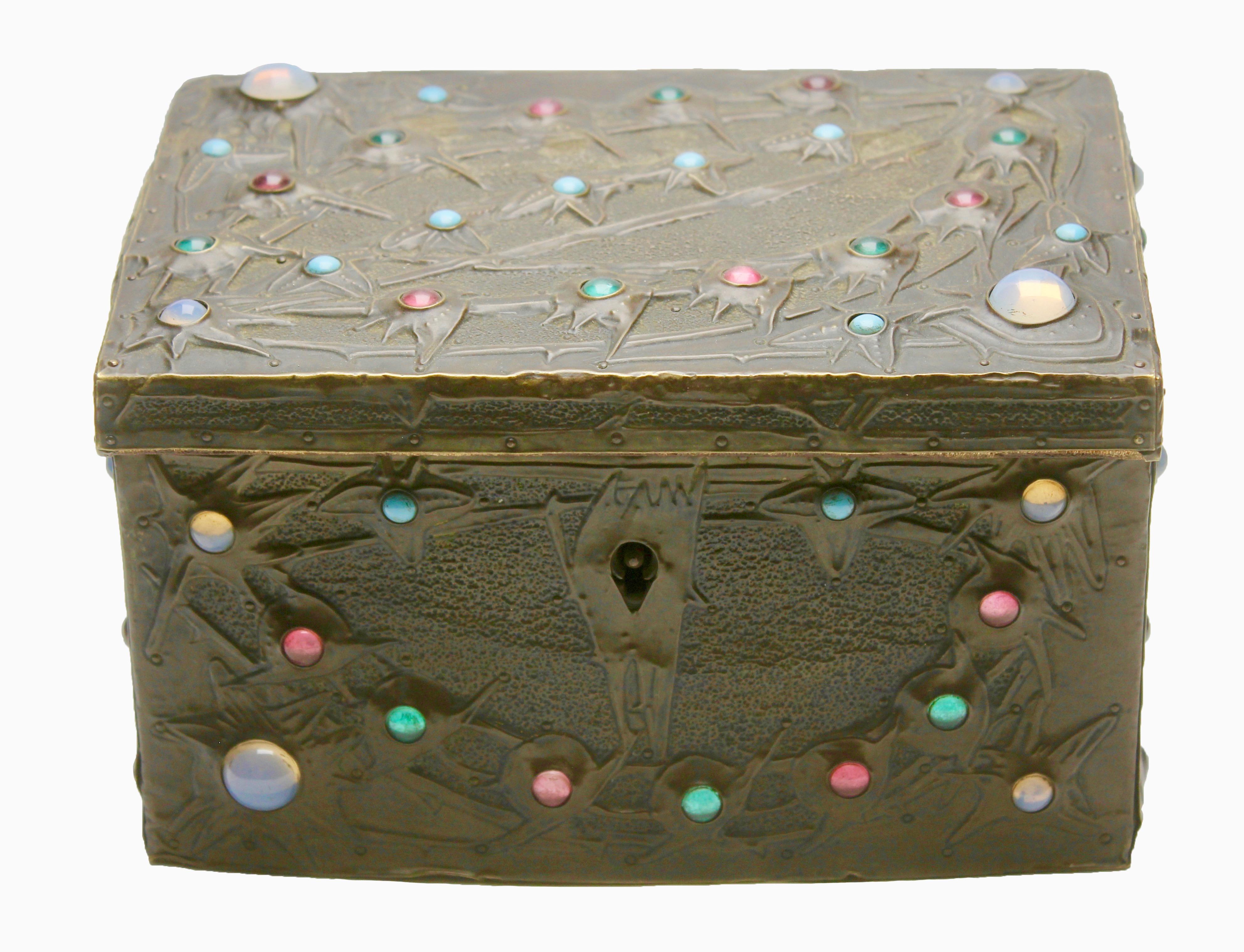 Alfred-Louis-Achille Daguet
Box, circa 1900
Medium size
Design, wood, metal forget, copper hammered with glass cabochons.

Movement:
Art Nouveau

Dimensions:
4.72 in H x 7.1 in W x 4.72 in D
12 cm H x 18 cm W x 12 cm D

About:
Alfred Louis Achille