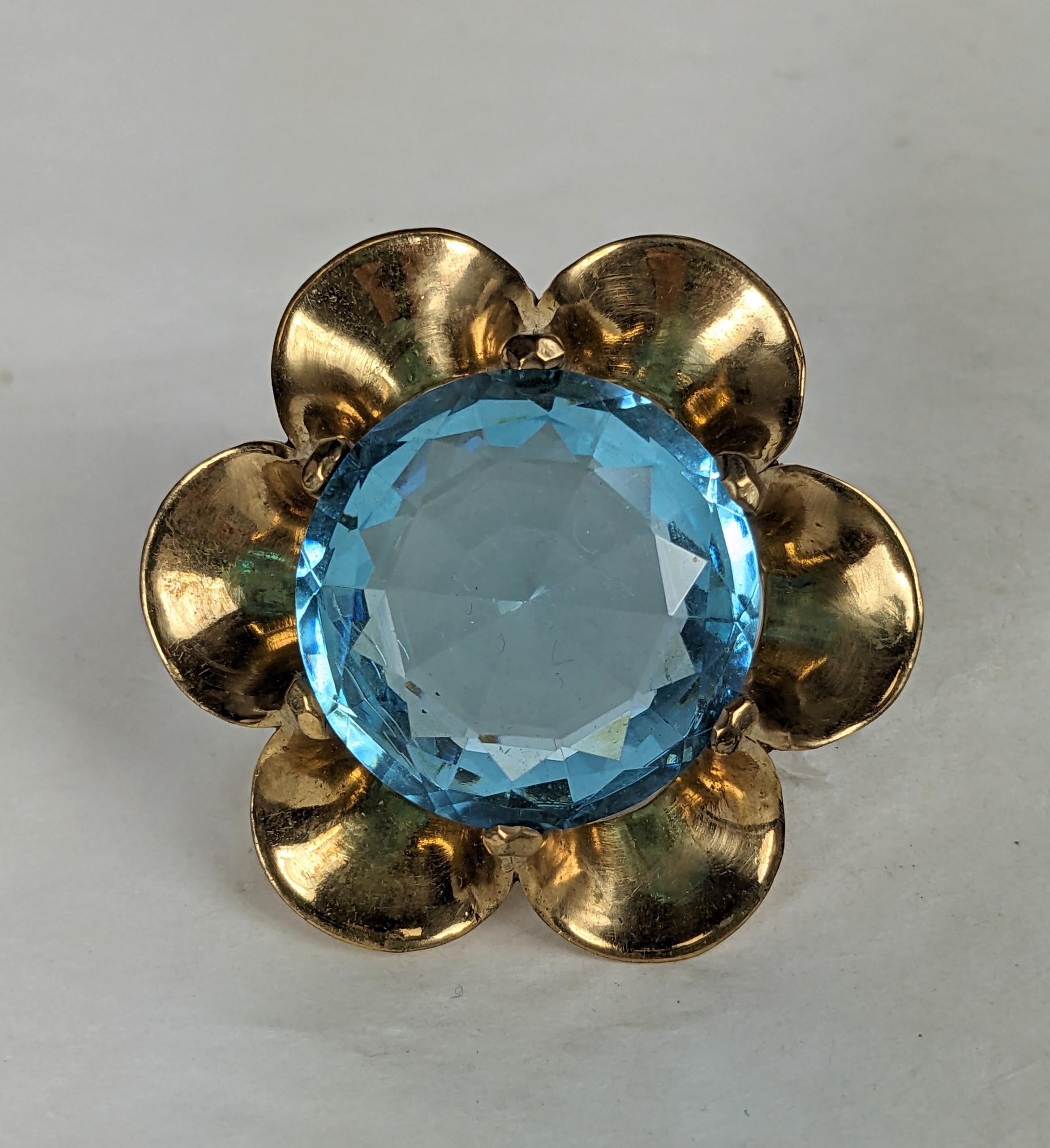 Alfred Philippe for Trifari aquamarine Retro clip brooch. Of gold plated base metal, the large aquamarine faceted stone set into a round Retro scalloped shell setting. Excellent Condition, Fur Clip back fitting, Matching Earclips are also available.