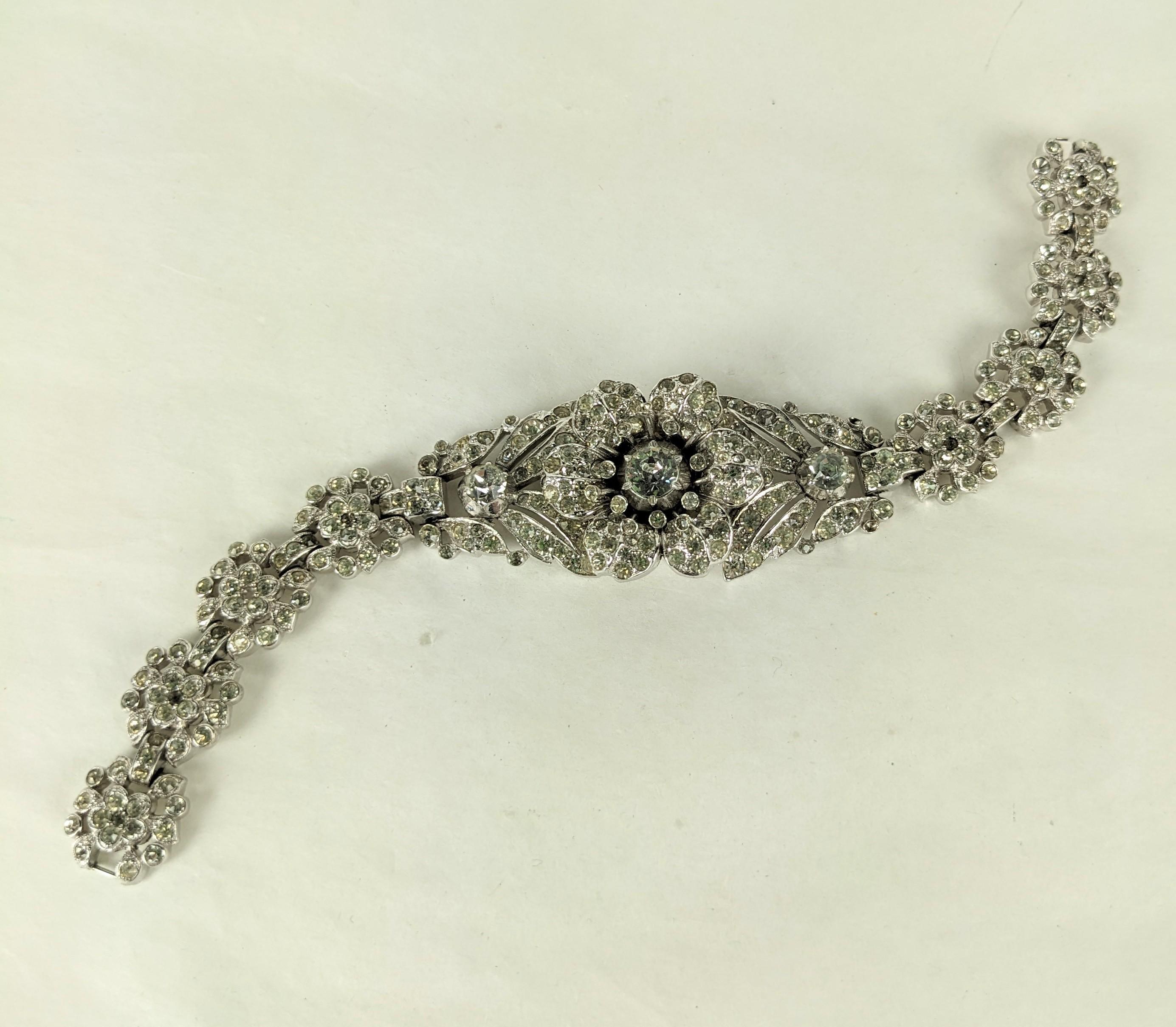 Alfred Philippe for Trifari Regence Pave Rose Bracelets of rhodium plated base metal, crystal rhinestones pave in the 18th Century style.  The flowers on each bracelet are stationary. 2 bracelets are available and are priced individually. Signed