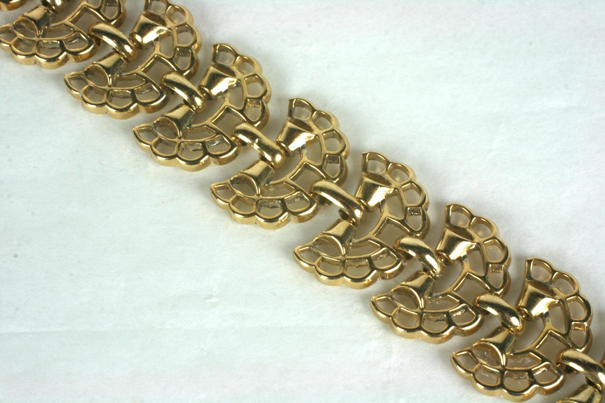Elegant Alfred Philippe for Trifari retro link bracelet composed of  gold plated base metal pierced fan shaped links.
Excellent Condition, Signed Trifari. 
Length  7