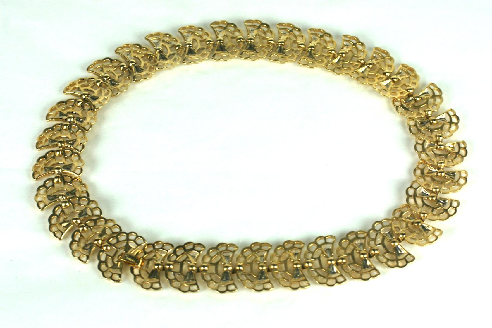 Elegant Alfred Philippe for Trifari retro link necklace composed of gold plated base metal pierced fan shaped links. 
Excellent Condition, Signed Trifari.  1940's USA. 
Length 16