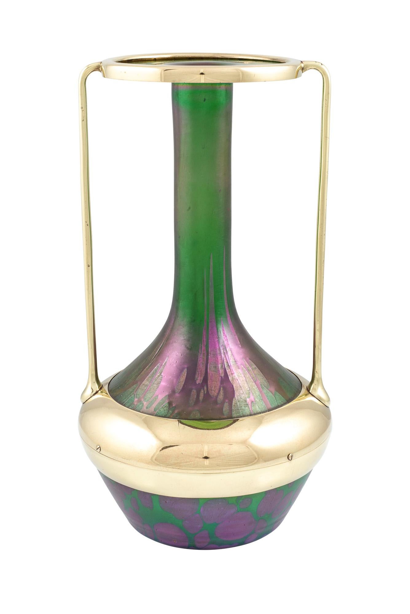 Glass vase with brass mounting designed by Alfred Roller manufactured by Johann Loetz Witwe PG 1/743 decoration ca. 1901 Austrian Jugendstil mould-blown reduced and iridescent Colorful Green Purple Art Nouveau

In close cooperation with many