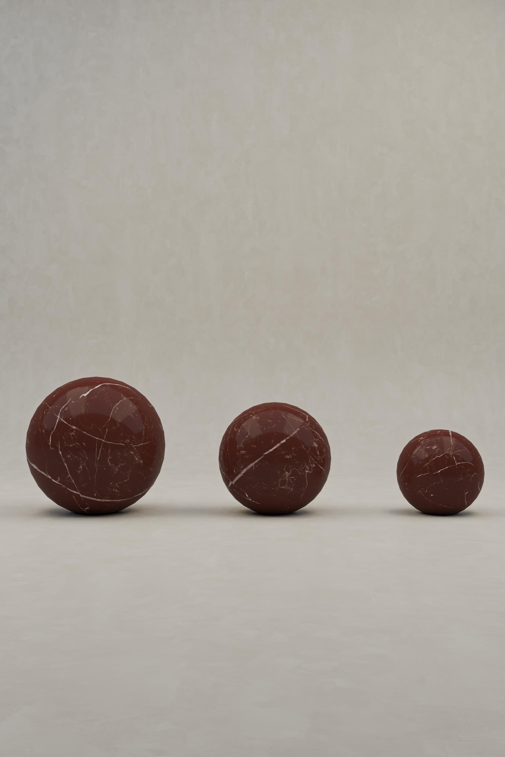 Description: The Alfred Sphere Set was designed as a stand alone or tri-figure decorative ornament for the home. 
Hand-crafted from solid blocks of natural and limited edition Desert Marble with a polished finished and flat stability