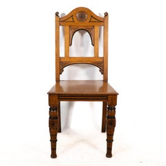 Alfred Waterhouse attributed for James Lamb. A Gothic Revival oak hall chair