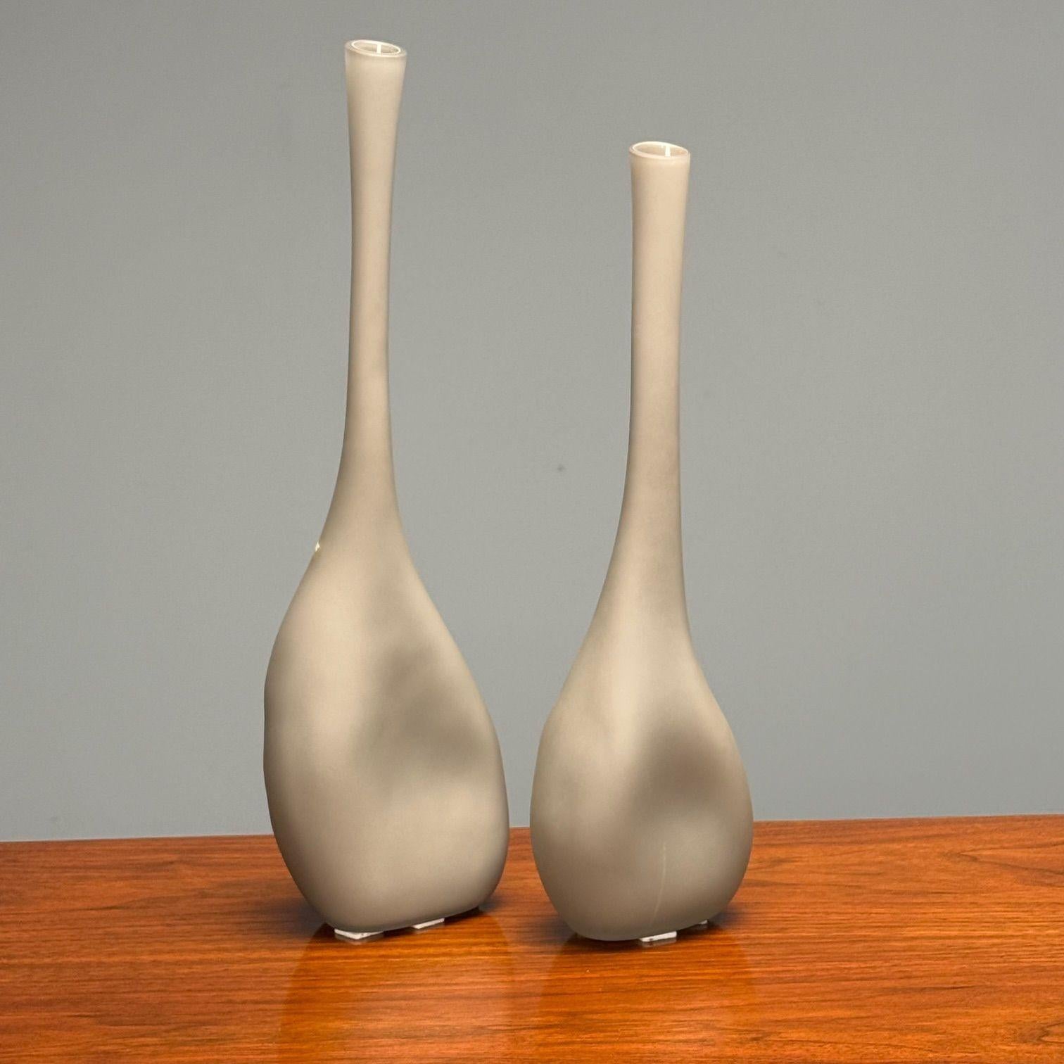 Alfredo Barbini, Italian Mid-Century Modern, Vases, Grey Murano Glass, Italy, 1970s

Pair of Alfredo Barbini's vases from the 1970s that exemplify the elegance of Italian Mid-Century Modern design. Characterized by their long necks and organic round