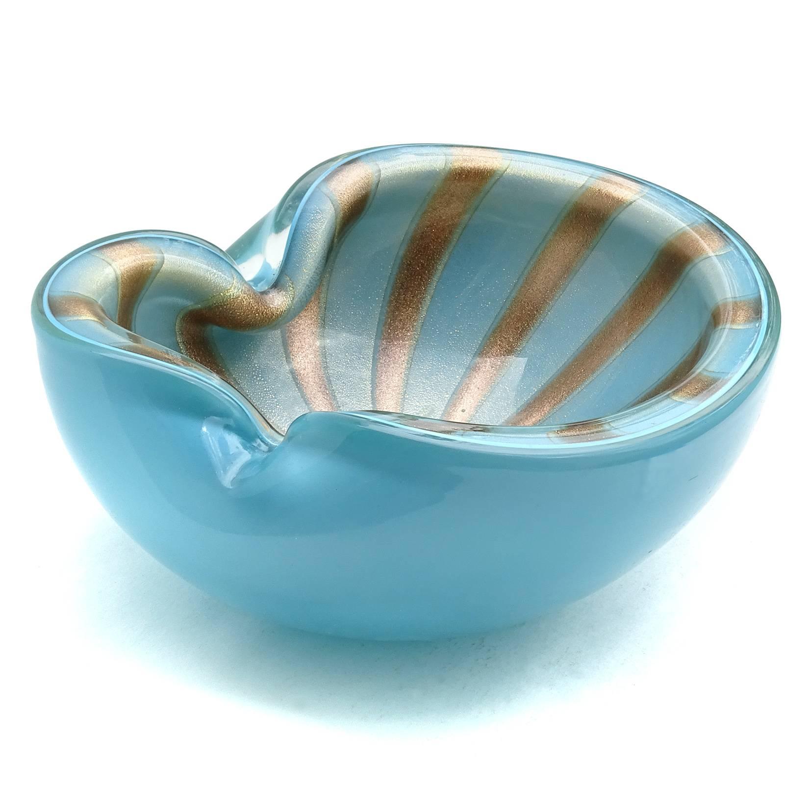 Gorgeous large Murano hand blown blue, gold and aventurine flecks Italian art glass bowl. Documented to Master glass artist and designer Alfredo Barbini, circa 1950-1960. Last one available in this color. Can be used as a display piece on any table.
