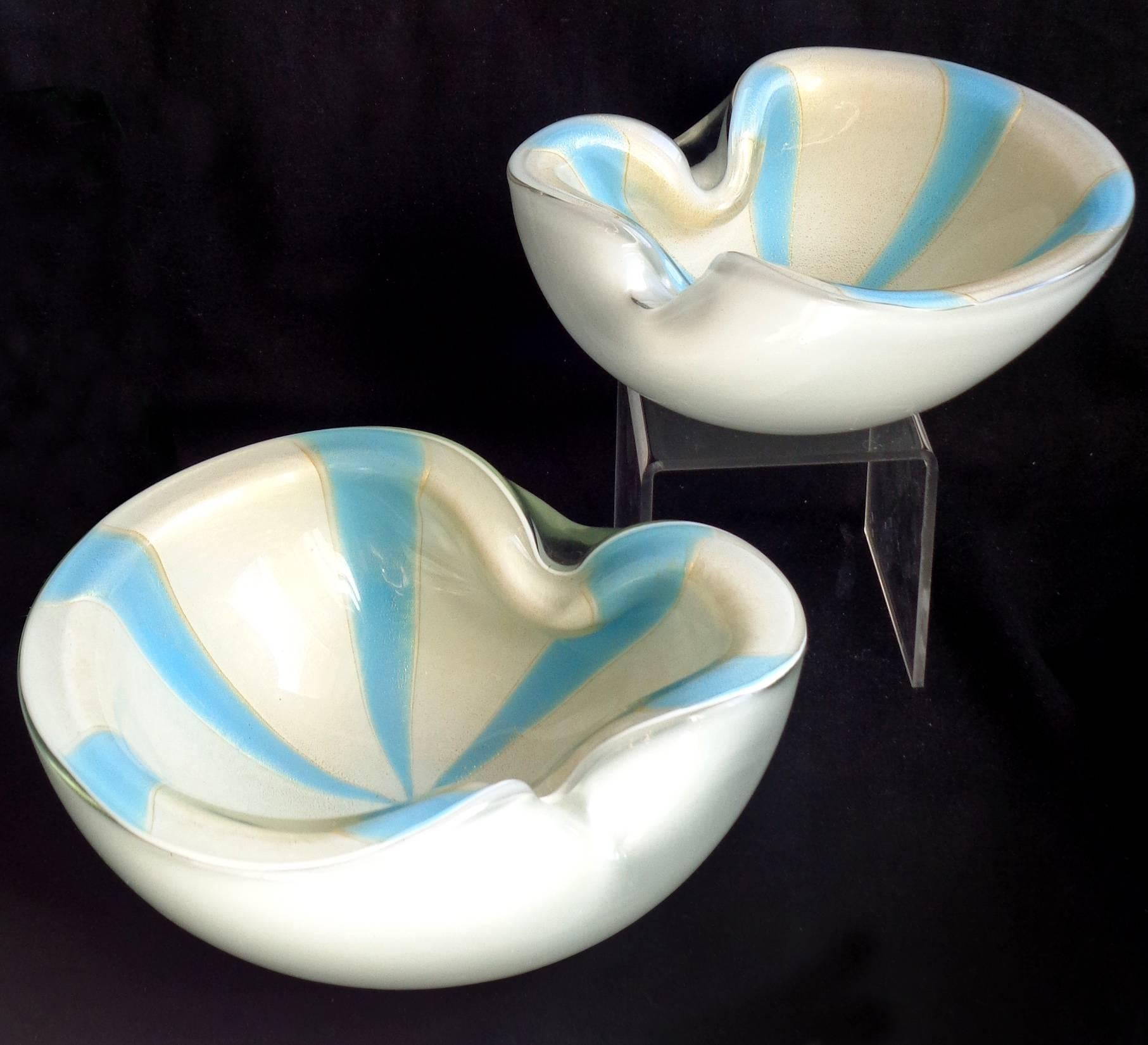 Beautiful set of vintage Murano hand blown white, blue stripes and gold flecks Italian art glass bowls. Documented to designer Alfredo Barbini, circa 1950-1960. Published in his catalog. Better than the photos show. Can be used as display pieces on