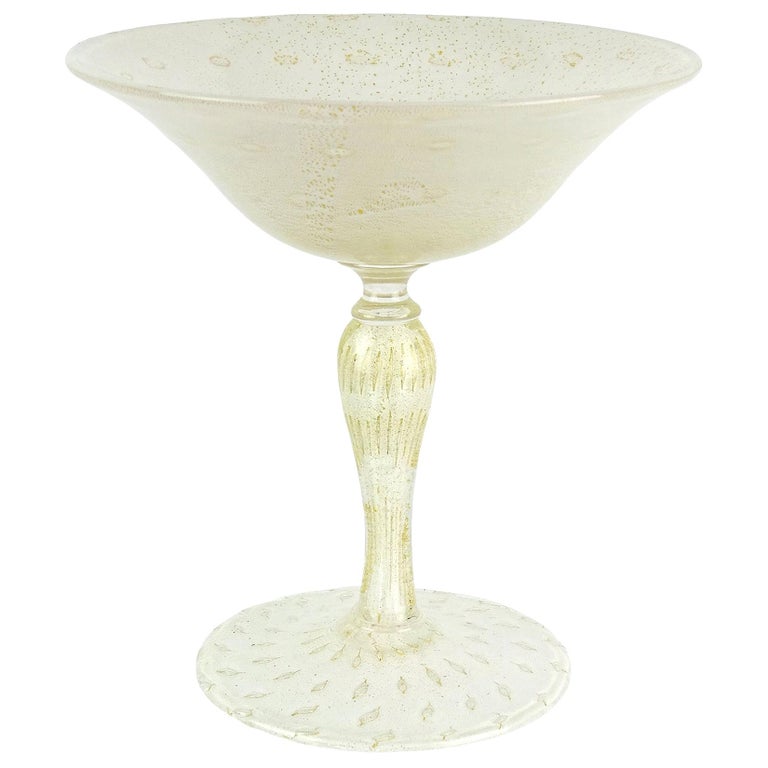 https://a.1stdibscdn.com/alfredo-barbini-murano-gold-flecks-white-italian-art-glass-martini-compote-bowl-for-sale/1121189/f_242224821624703877862/24222482_master.jpg?width=768