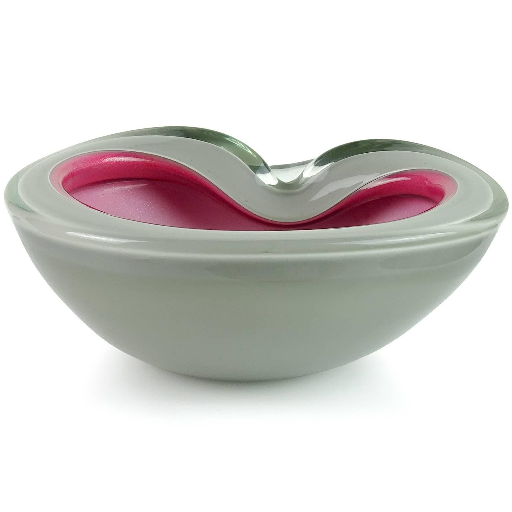 Beautiful vintage Murano hand blown gray over fuchsia pink and gold flecks Italian art glass decorative bowl. Documented to designer Alfredo Barbini. The piece has a partial worn label underneath the bowl. Great accent / display piece on any table.