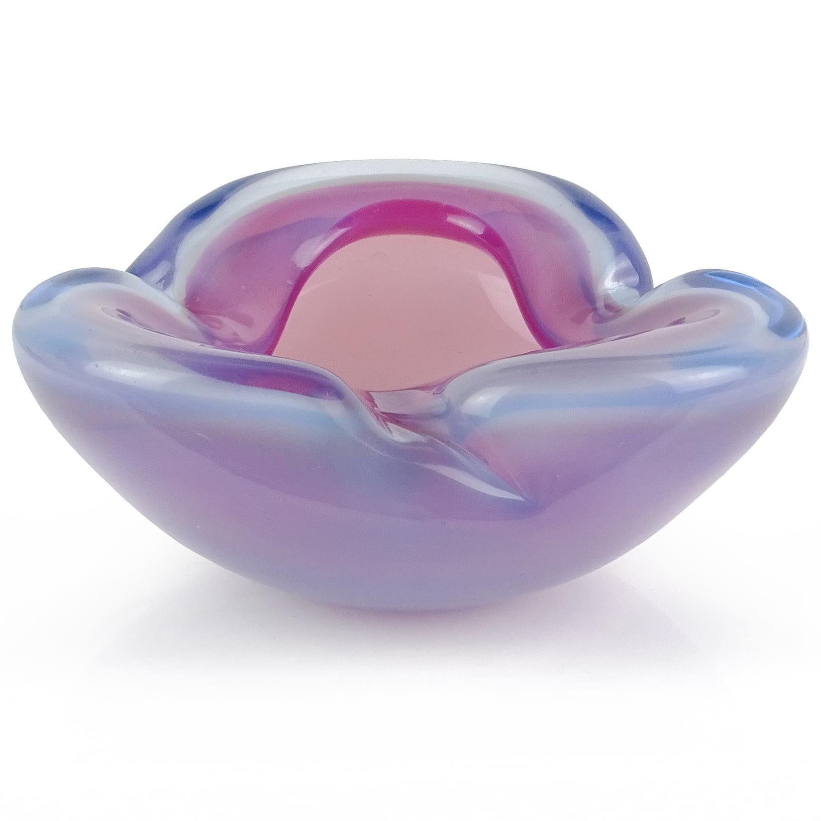 Beautiful vintage Murano hand blown Sommerso opalescent pink and blue Italian art glass bowl / dish. Documented to designer Alfredo Barbini. It has a folded over rim with decorative indent. In a darker background, the opal glass will really stand