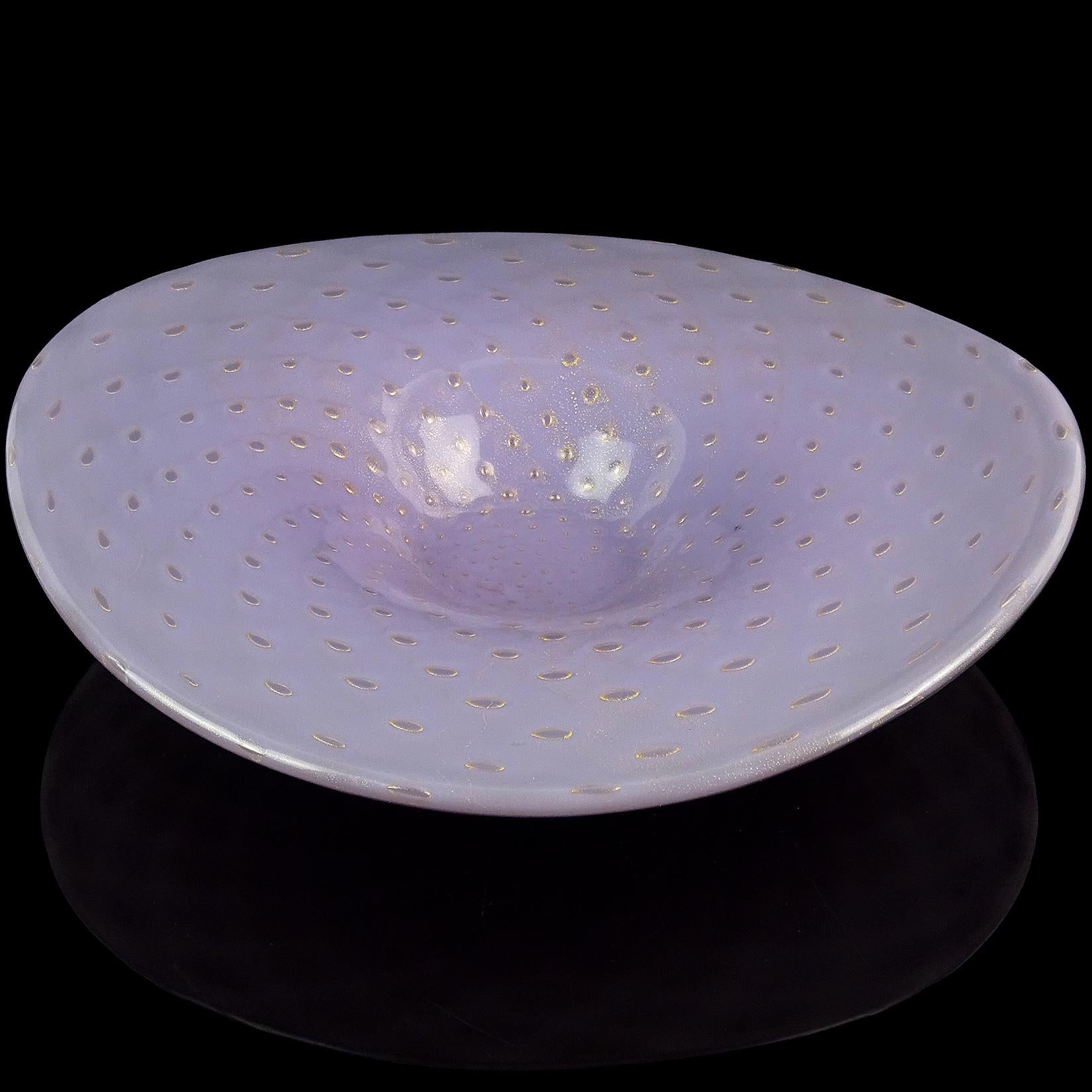 Beautiful Murano hand blown controlled bubbles, gold flecks and opaline purple Italian art glass centerpiece bowl. Documented to designer Alfredo Barbini, circa 1950s. Profusely covered in gold leaf, with the gold climbing to each of the bubbles.