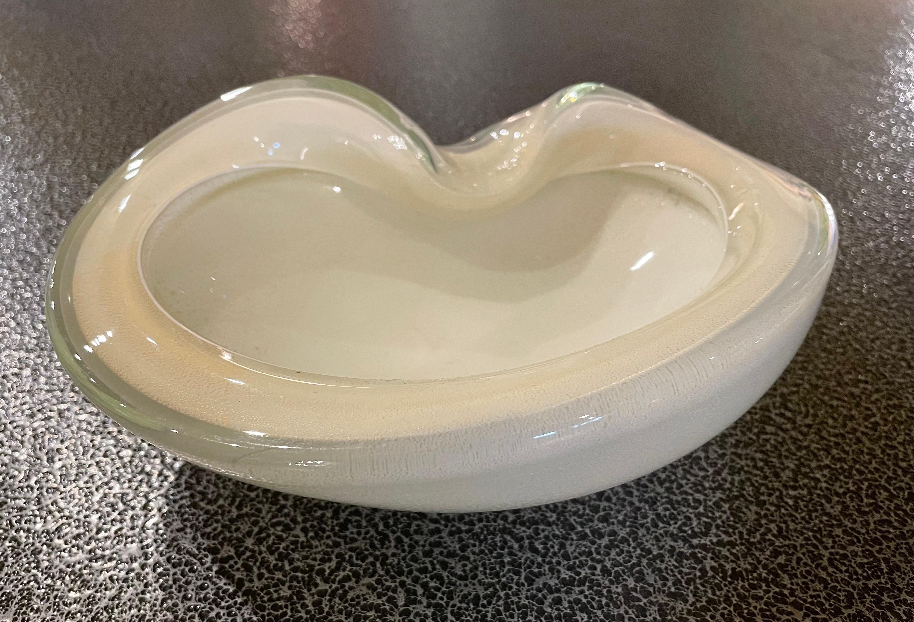 Beautiful vintage freeform Murano handblown white and gold flecks Italian art glass decorative bowl. Documented to designer Alfredo Barbini gold leaf inside and outside. Striking piece in any room. Can be used as a display piece on any table. Use it