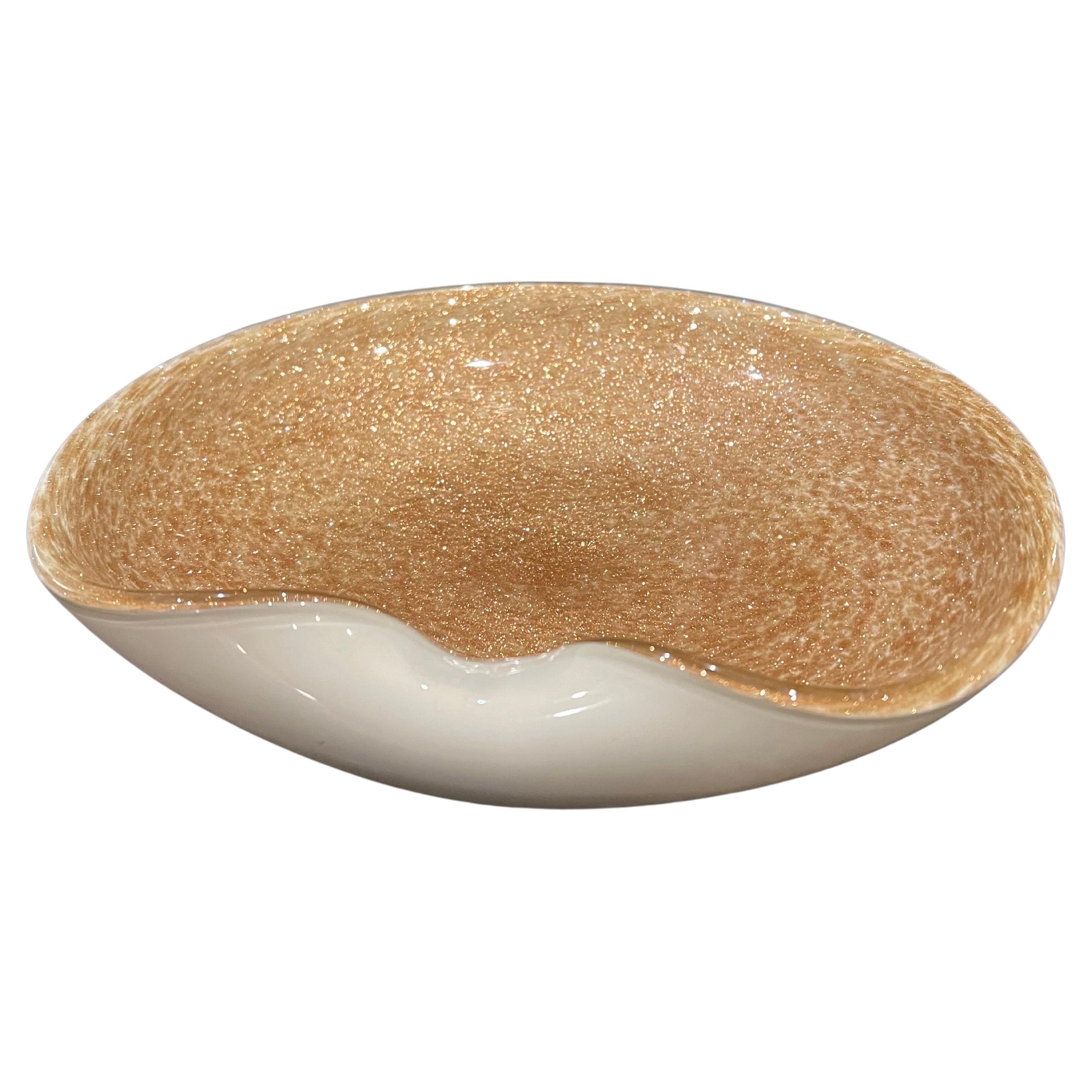 Beautiful vintage freeform Murano handblown white and rose gold flecks Italian art glass decorative bowl. Documented to designer Alfredo Barbini gold leaf inside and outside. Striking piece in any room. Can be used as a display piece on any table.
