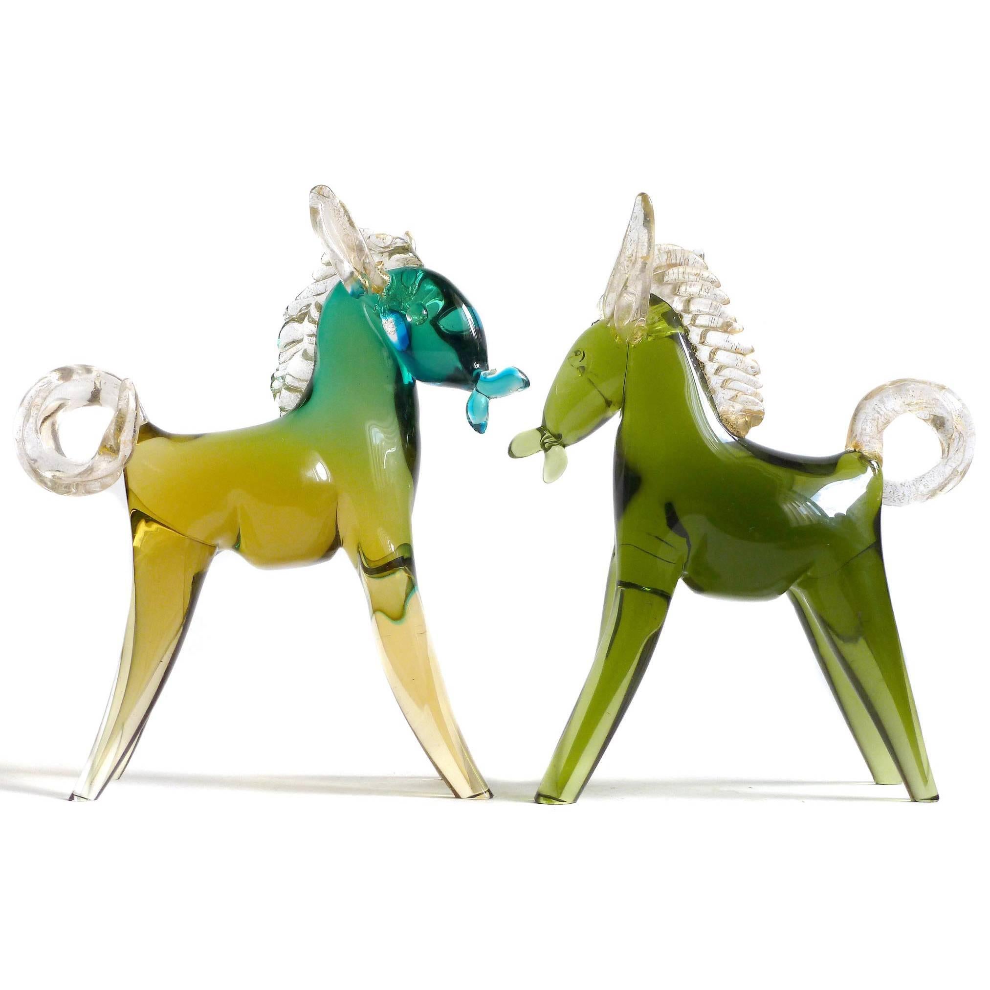 Beautiful and cute set of vintage Murano hand blown Sommerso and gold flecks Italian art glass horses / ponies figurines. Documented to designer Alfredo Barbini, circa 1950-1960s. Sold as a set on this listing, but can be sold individually if