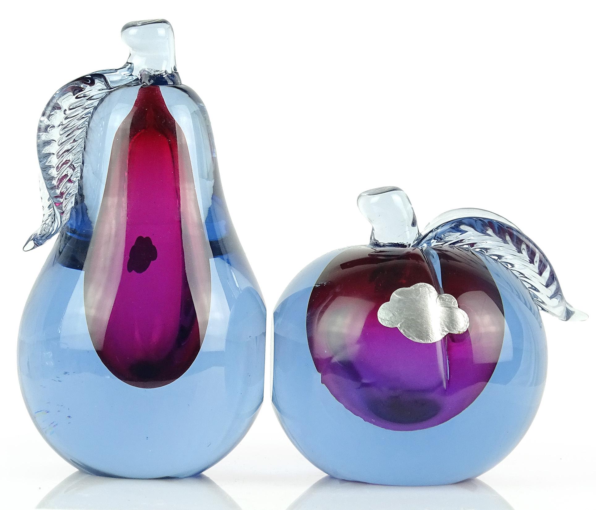Beautiful vintage Murano hand blown, Sommerso blue over purple art glass pear and apple fruit bookends. Documented to designer Alfredo Barbini, circa 1950-1960. Original labels still attached (but worn), as well as item number labels underneath. The