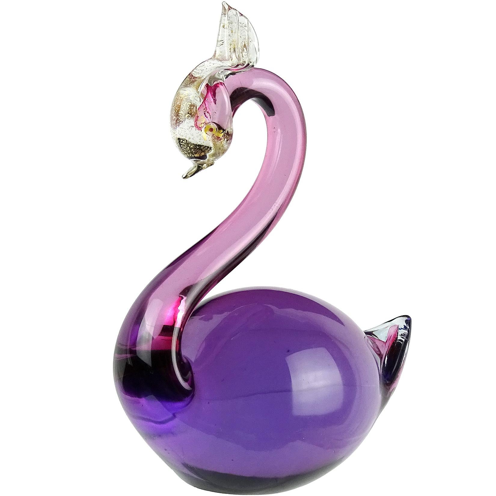 Beautiful Murano hand blown Sommerso purple and gold flecks Italian art glass swan figurine. Documented to designer Alfredo Barbini. Still retains the original gallery label. Very elegant shape. Has gold leaf on his head. Measures: 5