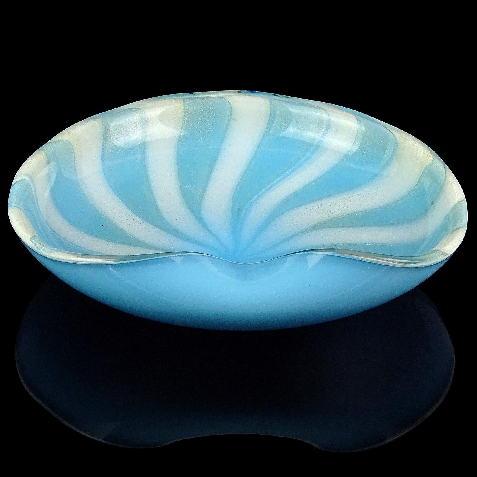 Beautiful large vintage Murano hand blown sky blue, white stripes and gold flecks Italian art glass center bowl. Documented to Master glass artist and designer Alfredo Barbini, circa 1950s. The bowl has a folded over rim, and is profusely covered in