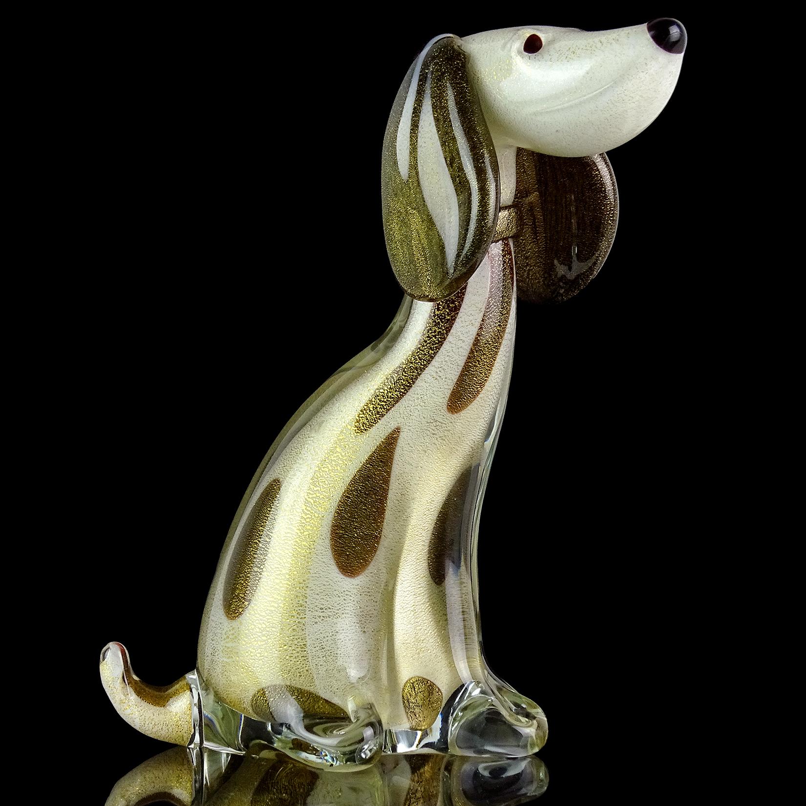 Gorgeous Murano hand blown white, black spots and gold flecks Italian art glass Dalmatian puppy dog sculpture. Documented as an Alfredo Barbini piece, circa 1950-1960. The figure is published in his Weil ceramics and glass catalog. It is profusely