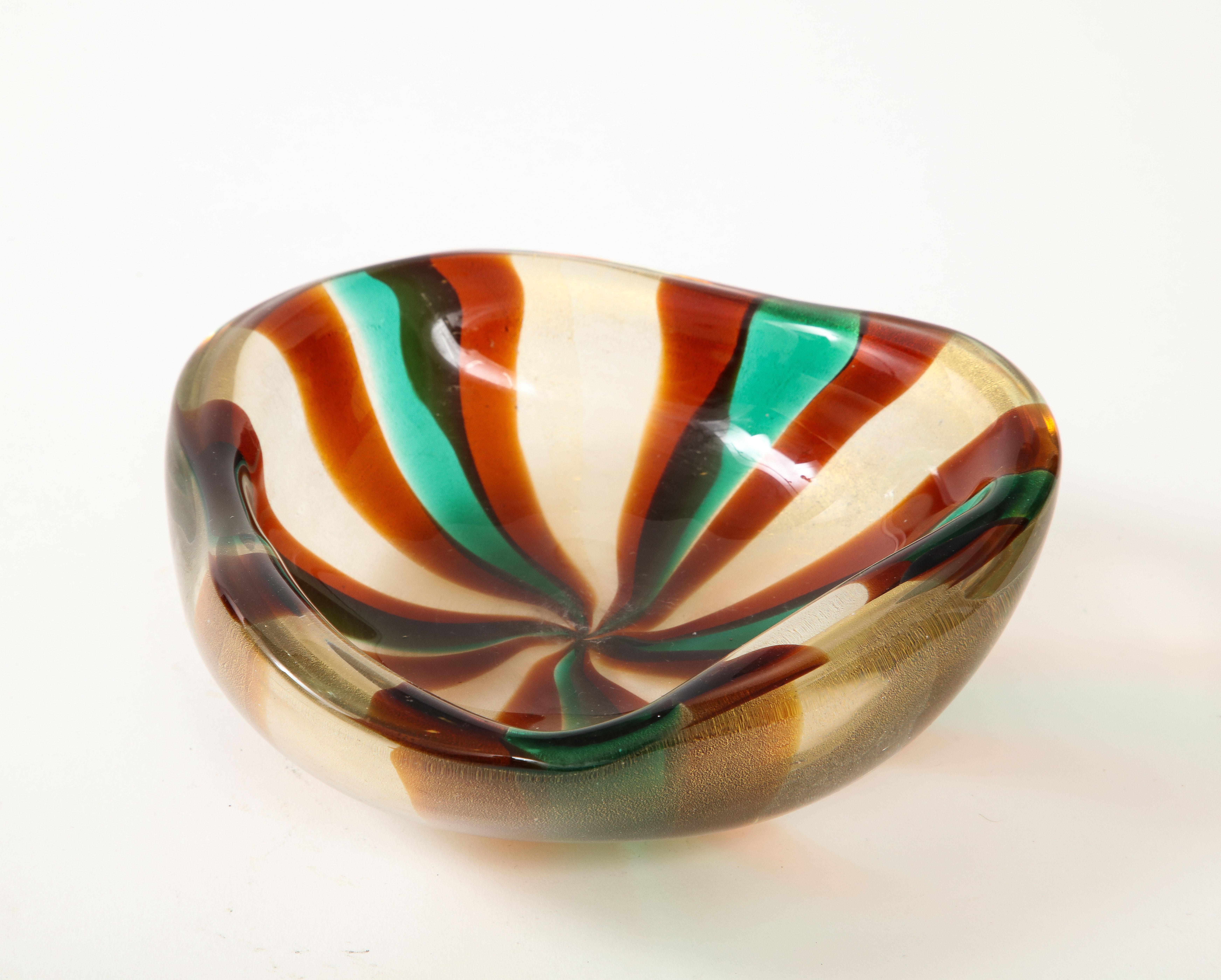 Midcentury hand blown Murano glass vessel featuring green and red stripes encased in clear glass with 22kt gold inclusions.