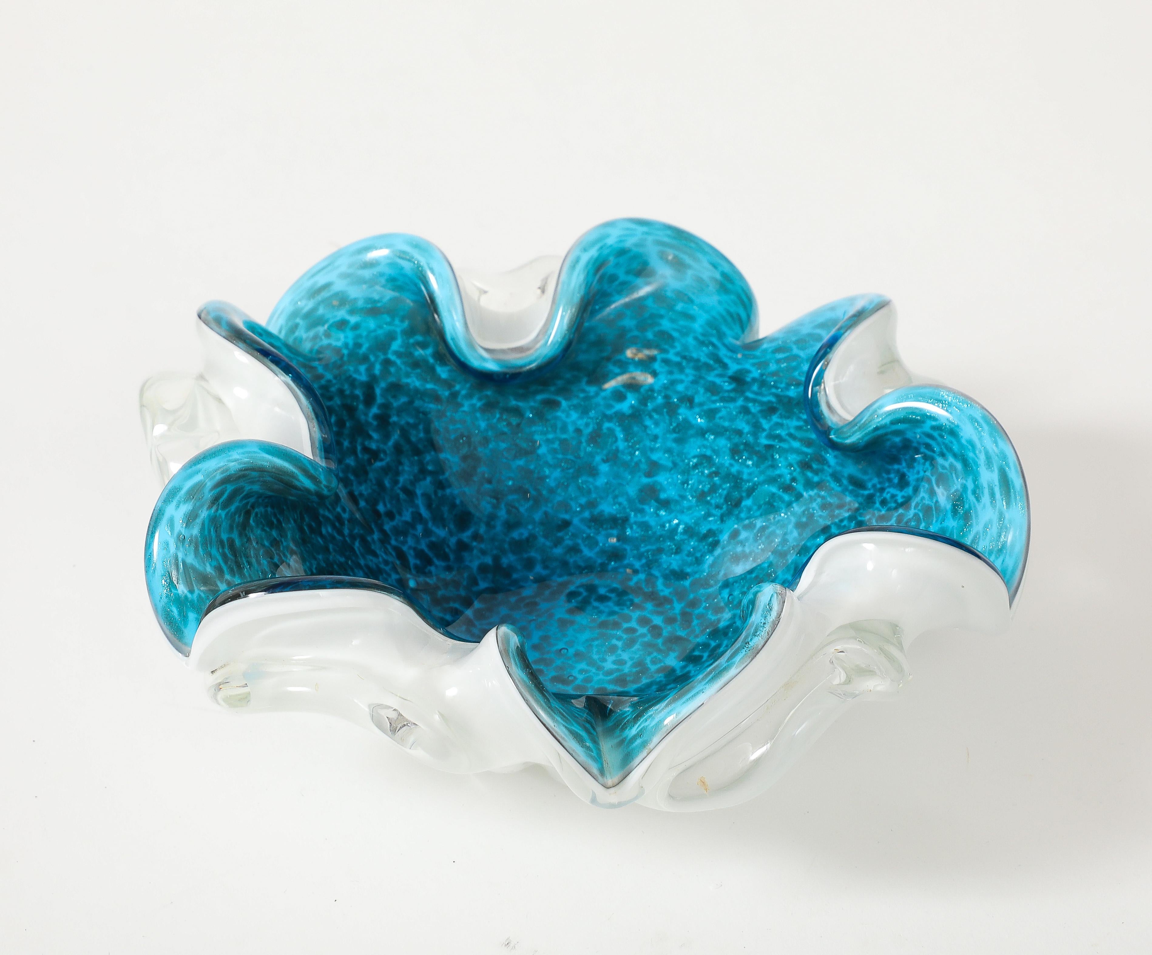 Exquisite letuuce edge vide poche in turquoise Murano glass caased in a white glass outer layer. Copper and gold fleck inclusions throughout the interior. 