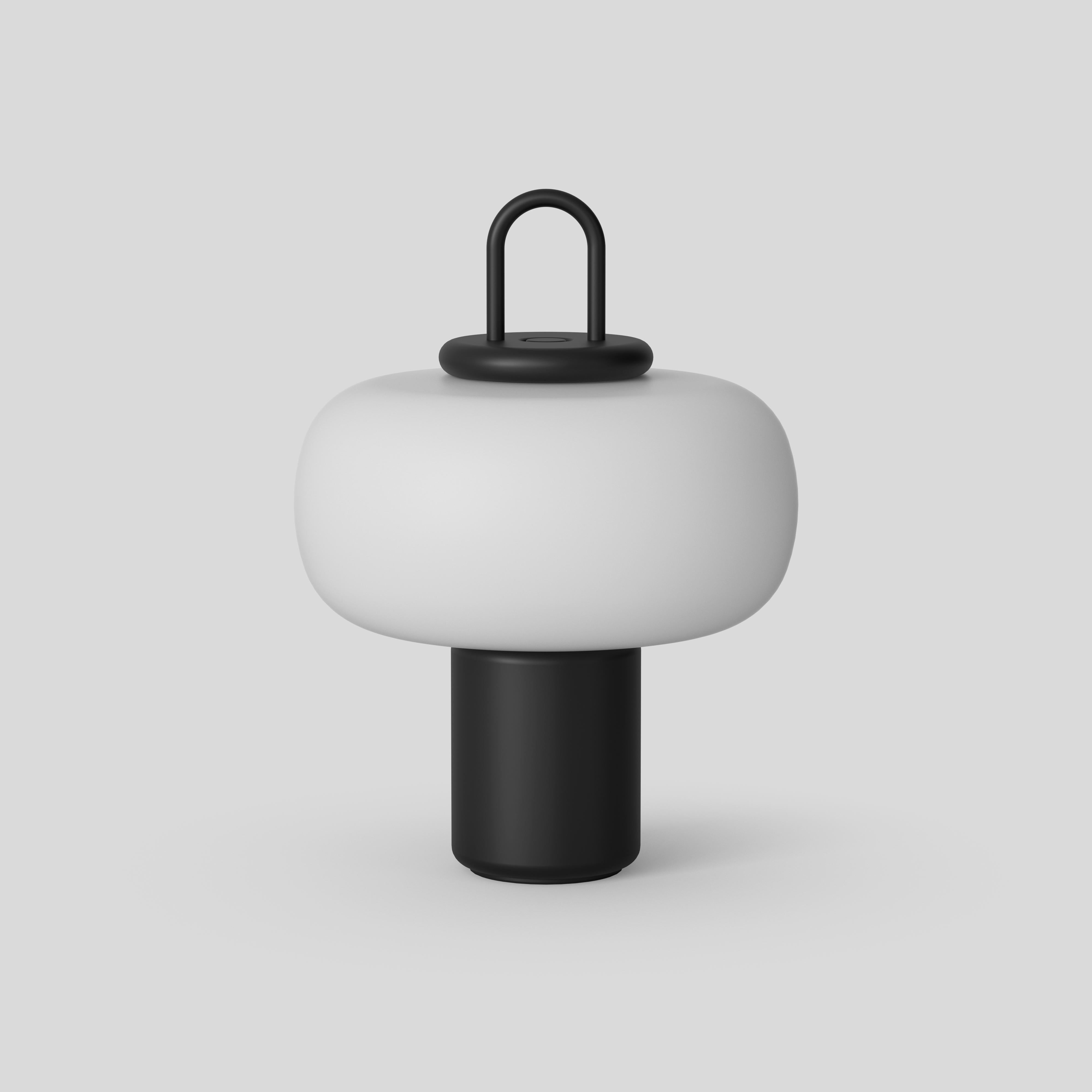 Nox
Design by Alfredo Häberli
Distinctive to Nox is its wireless charging system with induction technology, enabling this sophisticated and highly versatile lamp to be used unplugged. The Luminaire is composed of four elements: a charging base, an