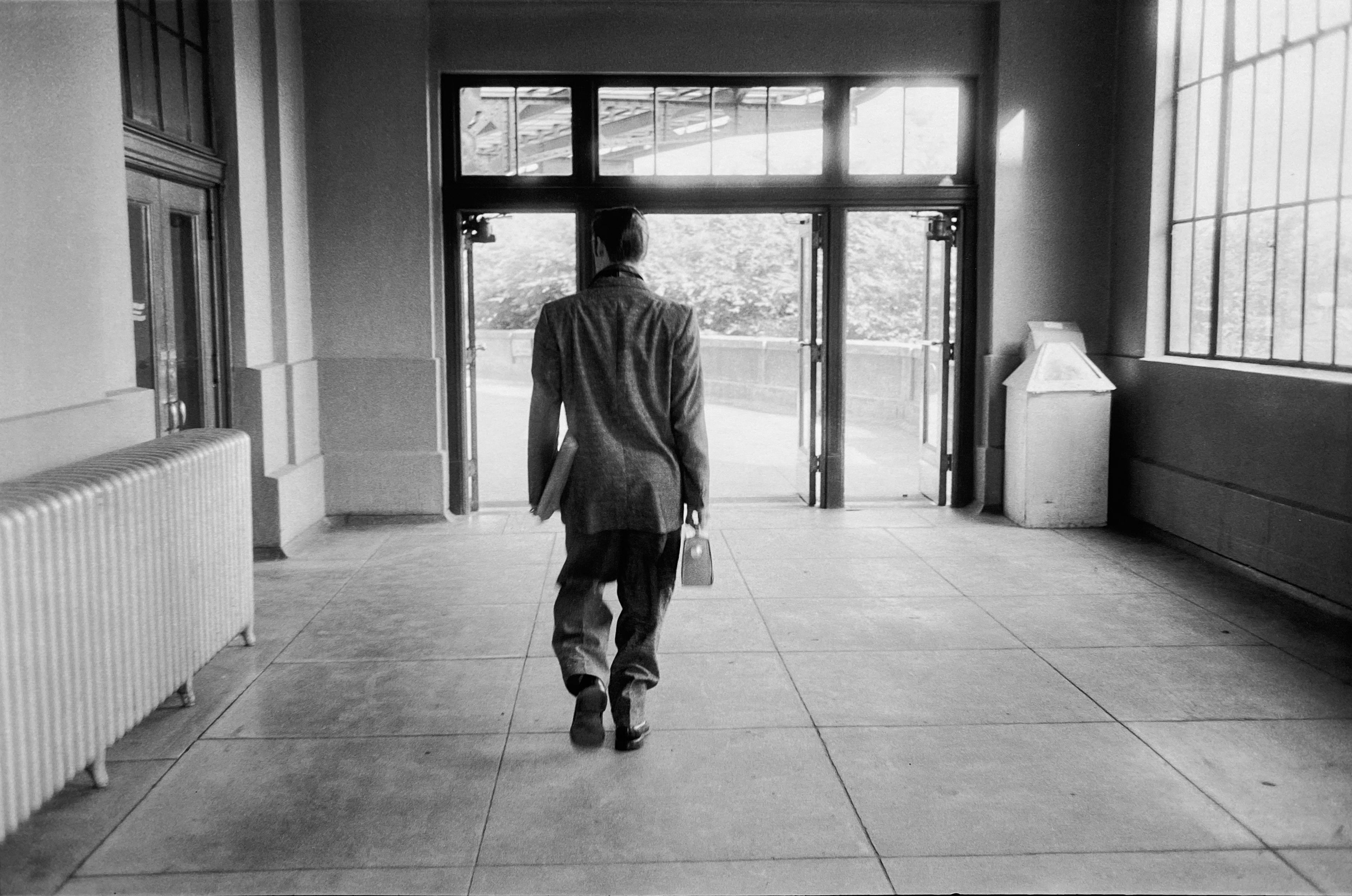 Elvis Leaving Richmond, Virginia Railroad Station - Photograph by Alfred Wertheimer