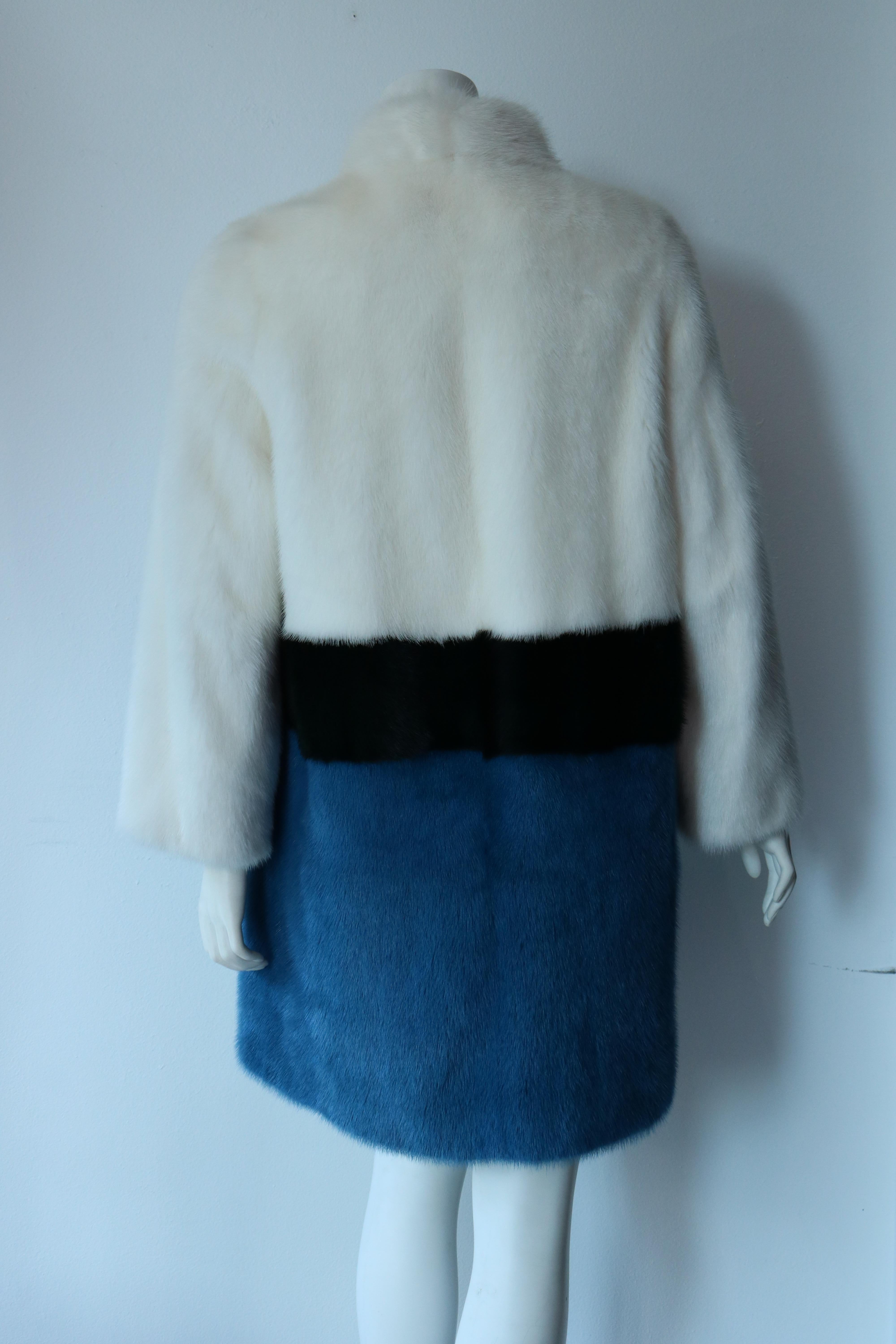 Algo white, blue and black mink fur coat with zipper. 
Pristine condition, never owned. 
Midi-length and silk lined. 
Size M
