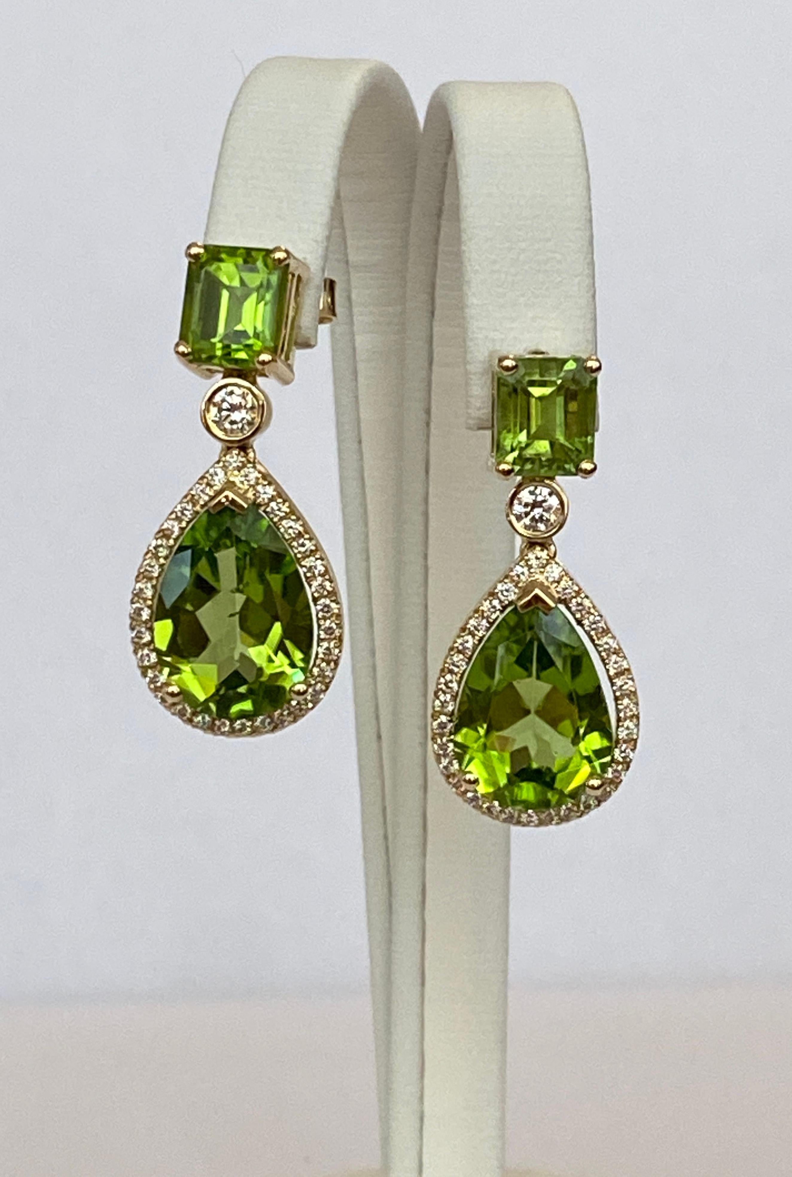 Offered in new condition, beautiful earrings in yellow 18 kt  gold with peridot and diamonds. ALGT certificate is included. Exclusive handmade  jewelry with high quality stones!

2 octagon step cut peridot total 4.35 ct Intense Yellowish green
2