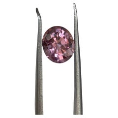 ALGT Certified 1.85 carat oval mixed cut Intense Pink Spinel