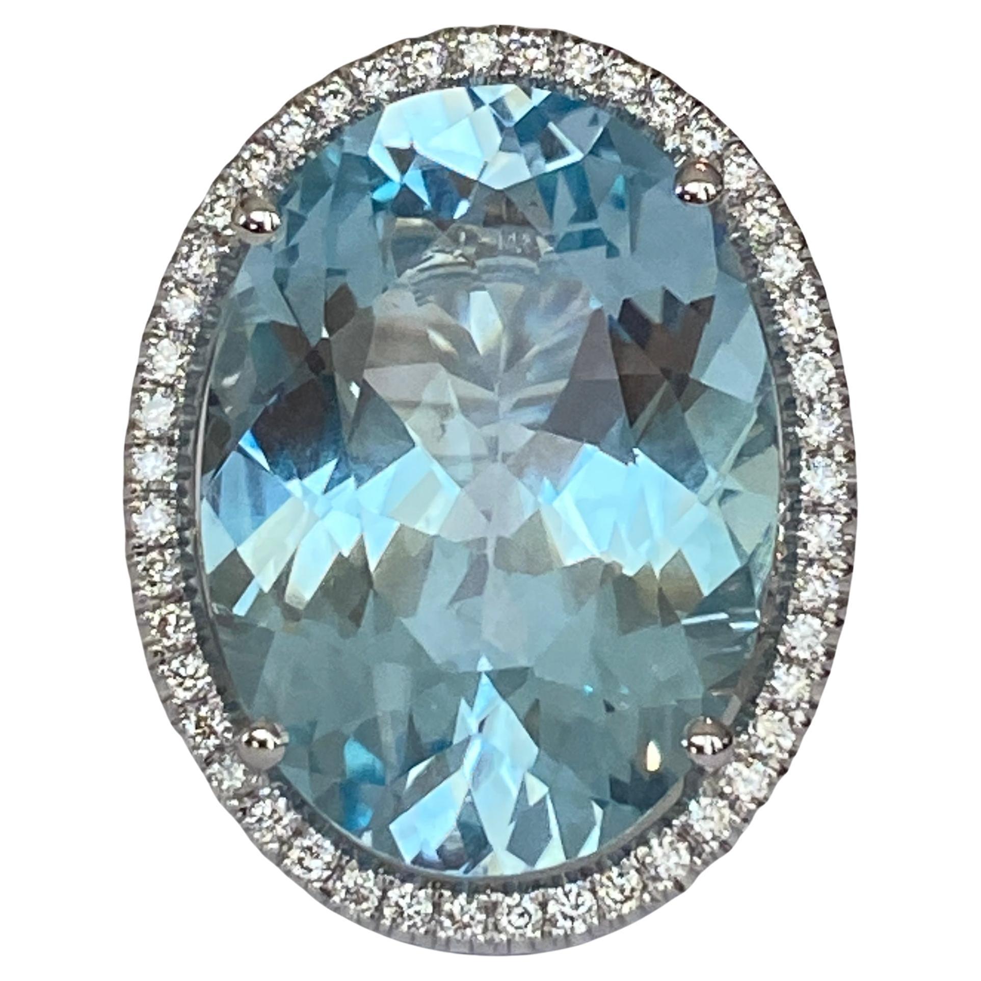 Exclusive exceptionally large handmade ring in 18 kt white gold ring with an oval faceted cut blue topaz of 34.00 ct!!! surrounded by 76 brilliant-cut diamonds, approx. 1.00 ct, H/VS/SI quality.
Rank: 750 (marked)
Natural Blue Topaz - 34.00 ct