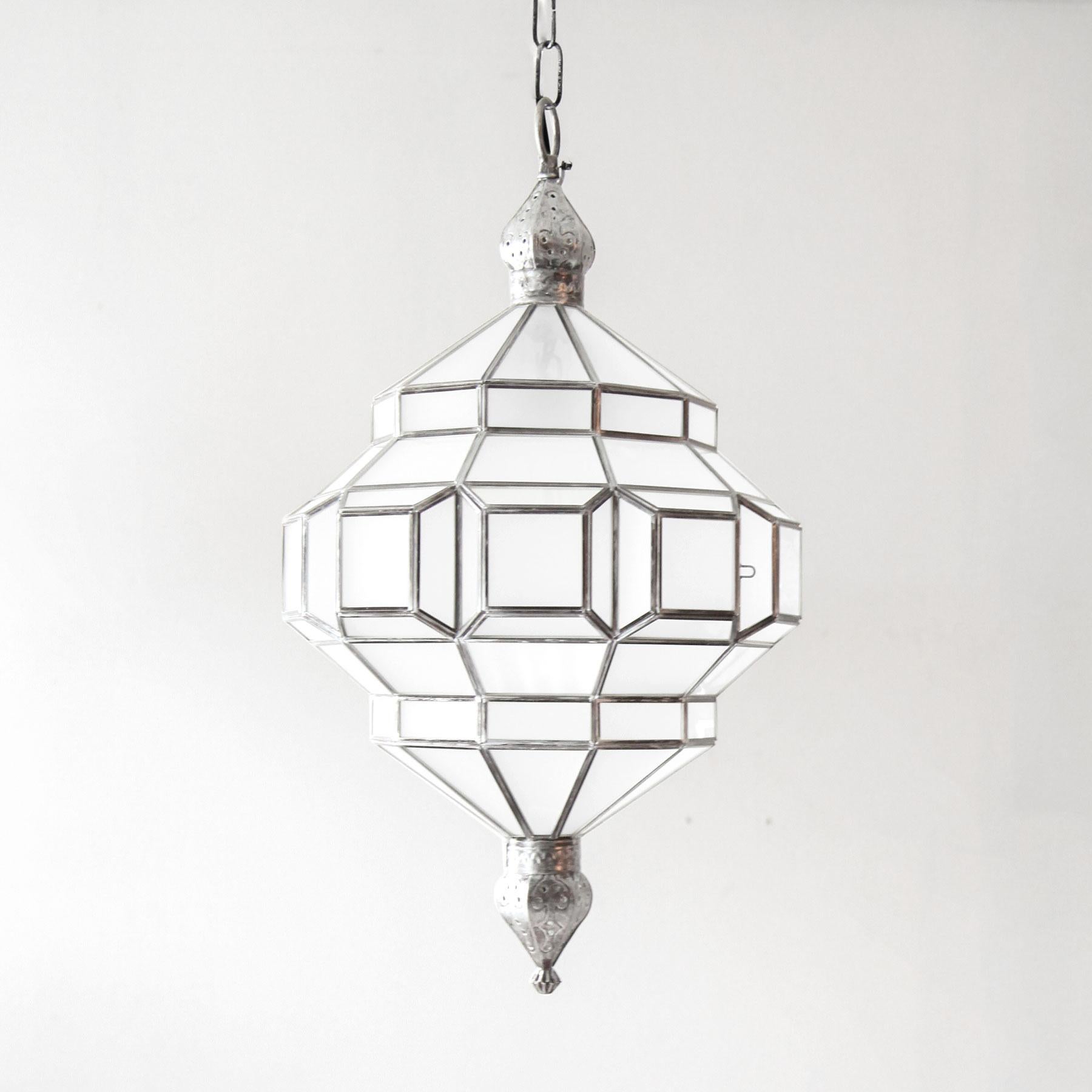 These glass lanterns are made in a generations-old workshop in Granada, Spain. Each pendant light is hand forged, and reflects the influence of Moorish design that can be observed throughout the region.

These lanterns, with their multitude of