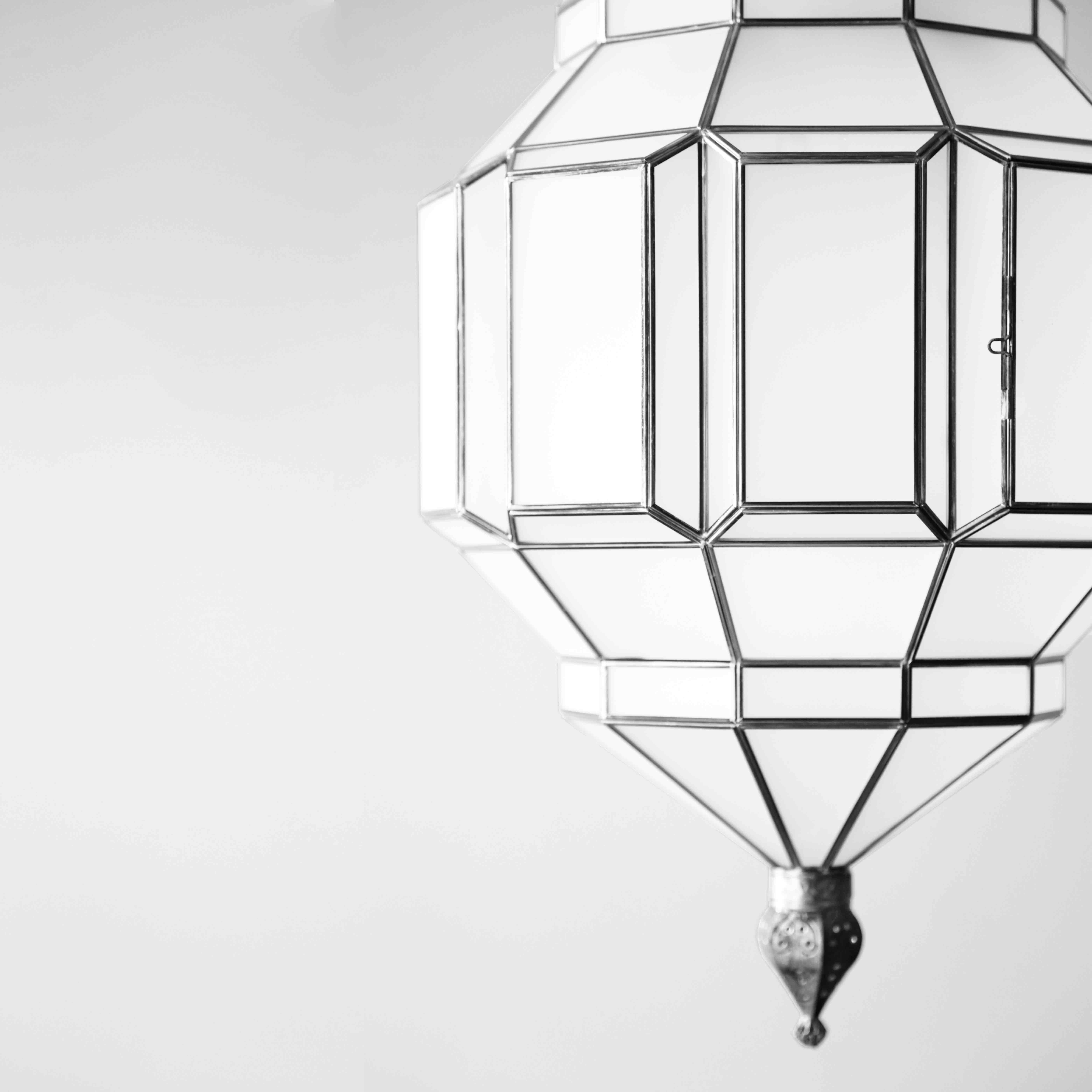 These glass lanterns are made in a generations-old workshop in Granada, Spain. Each pendant light is hand forged, and reflects the influence of Moorish design that can be observed throughout the region.

These lanterns, with their multitude of